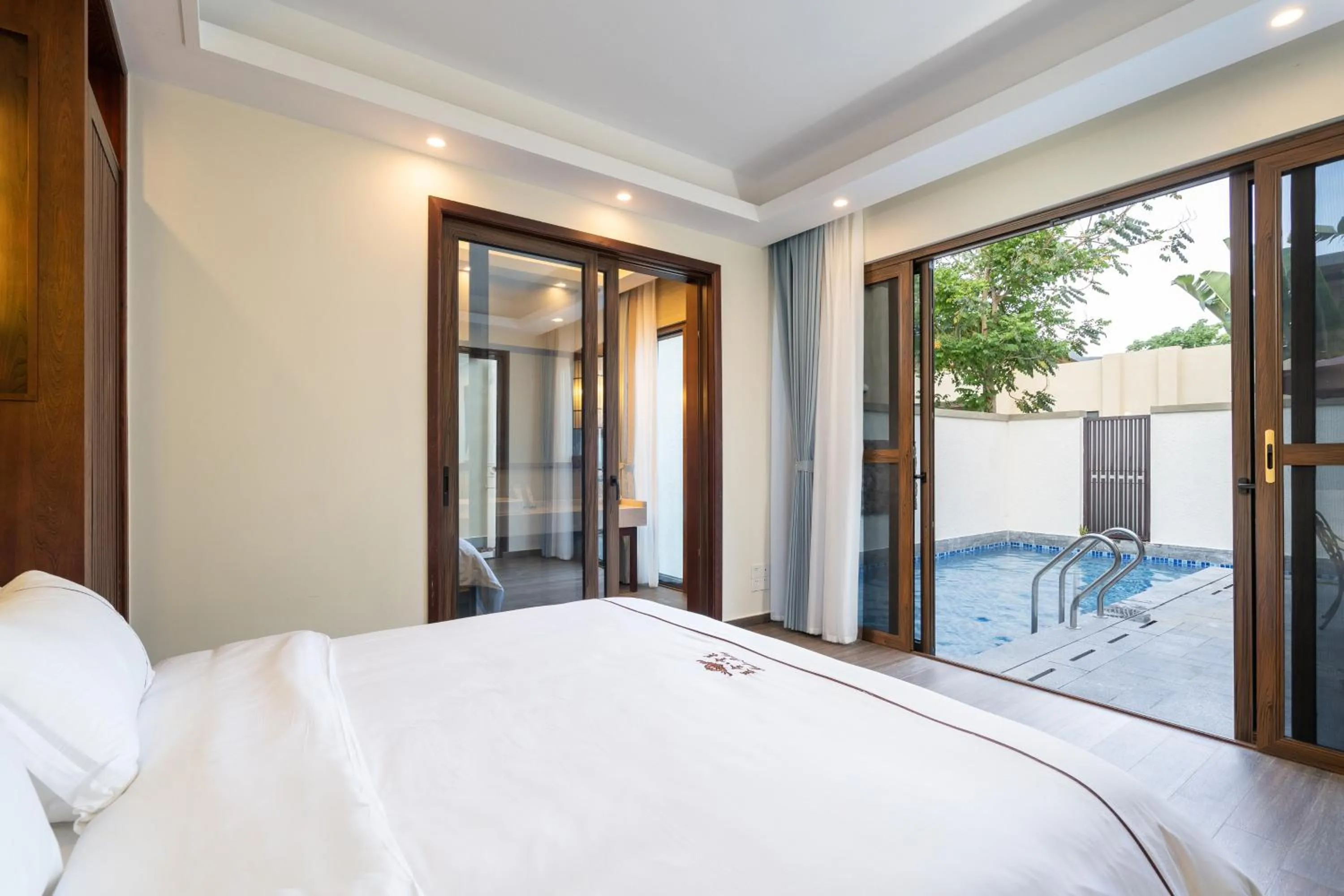 Bed in Iccssi Villa Haitang Bay Sanya