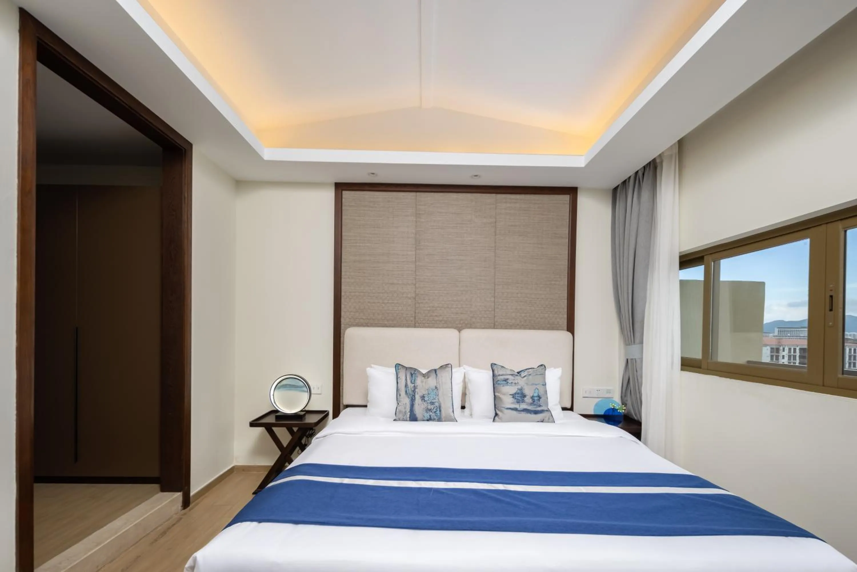 Bed in Iccssi Villa Haitang Bay Sanya