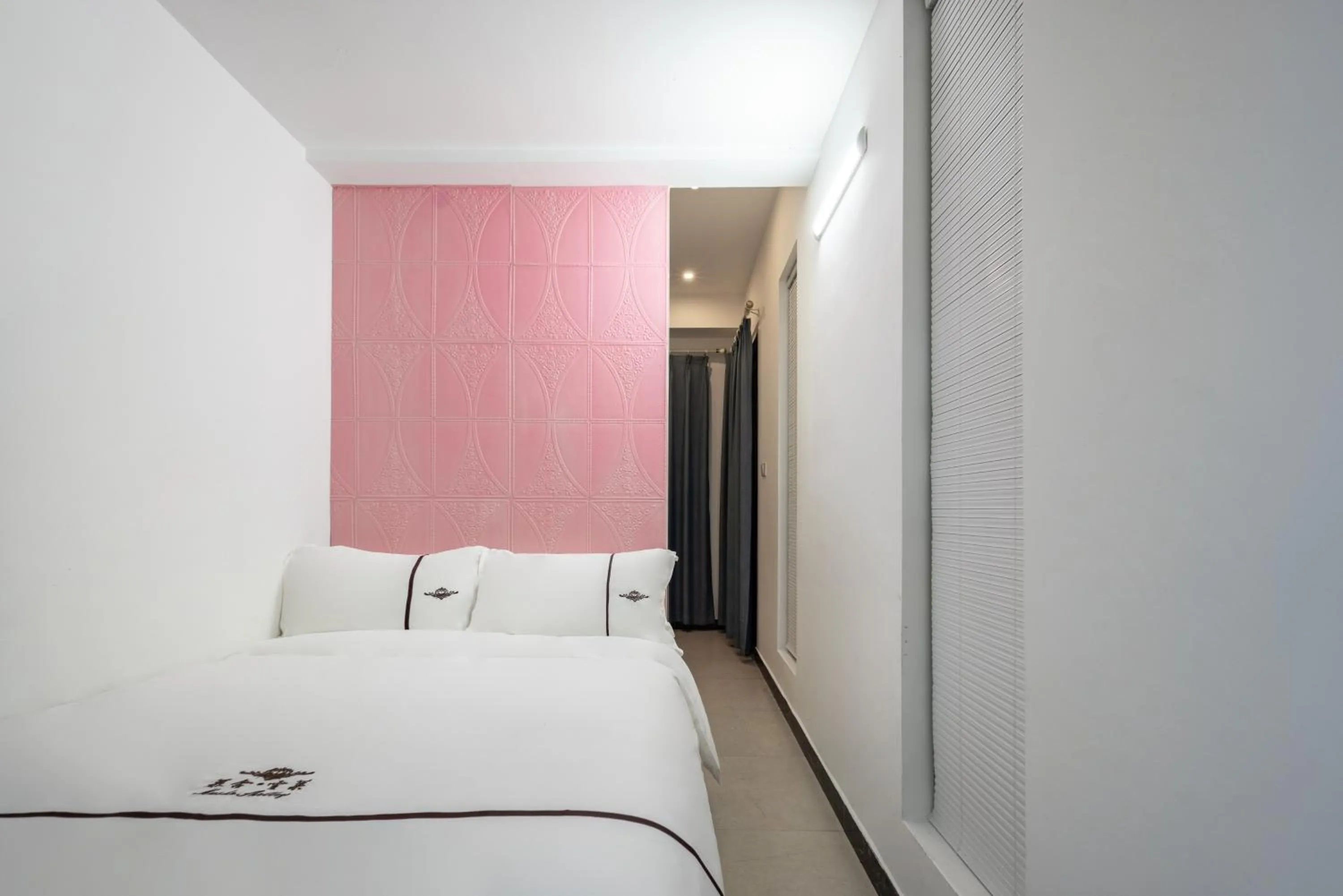 Bed in Iccssi Villa Haitang Bay Sanya