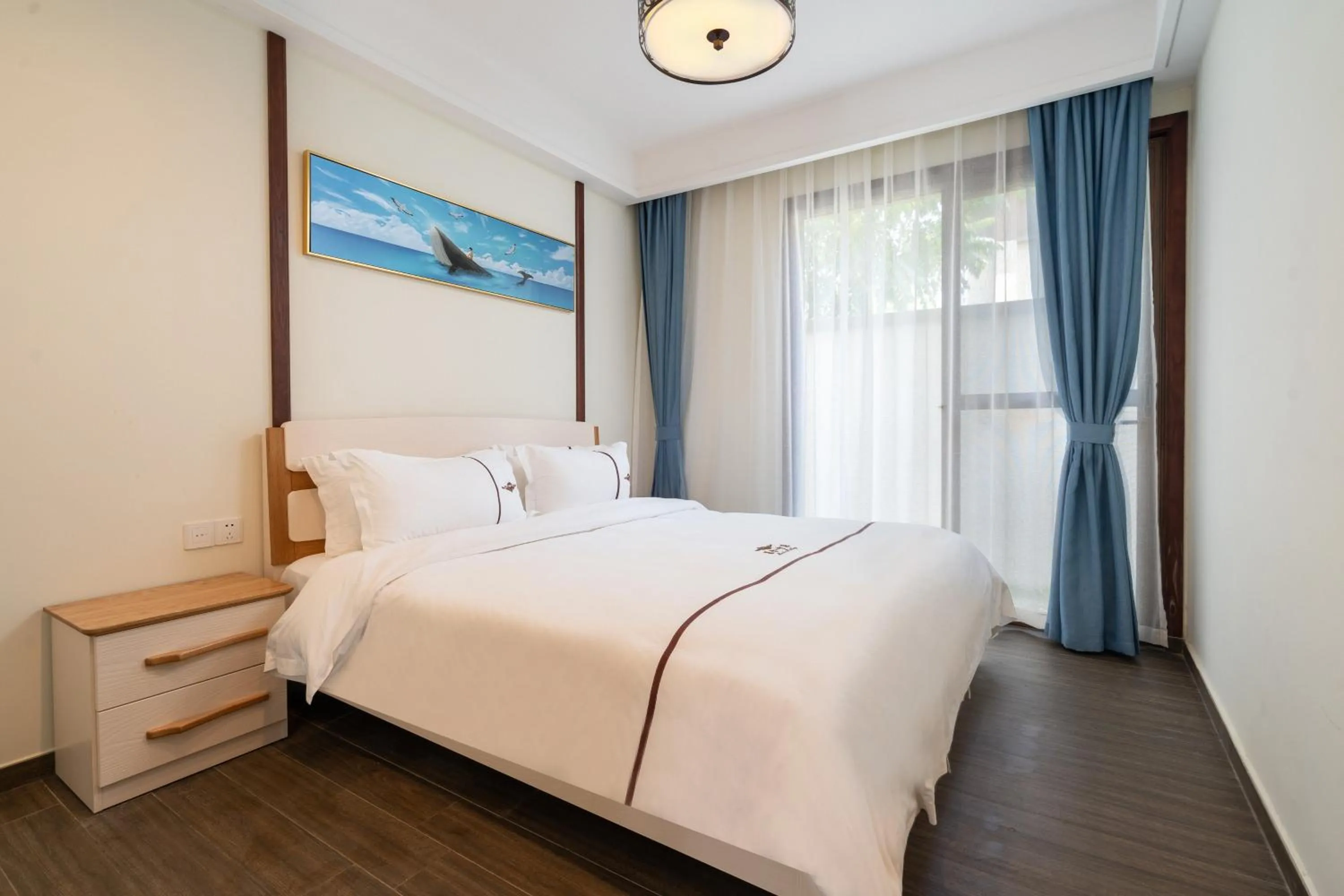 Bed in Iccssi Villa Haitang Bay Sanya