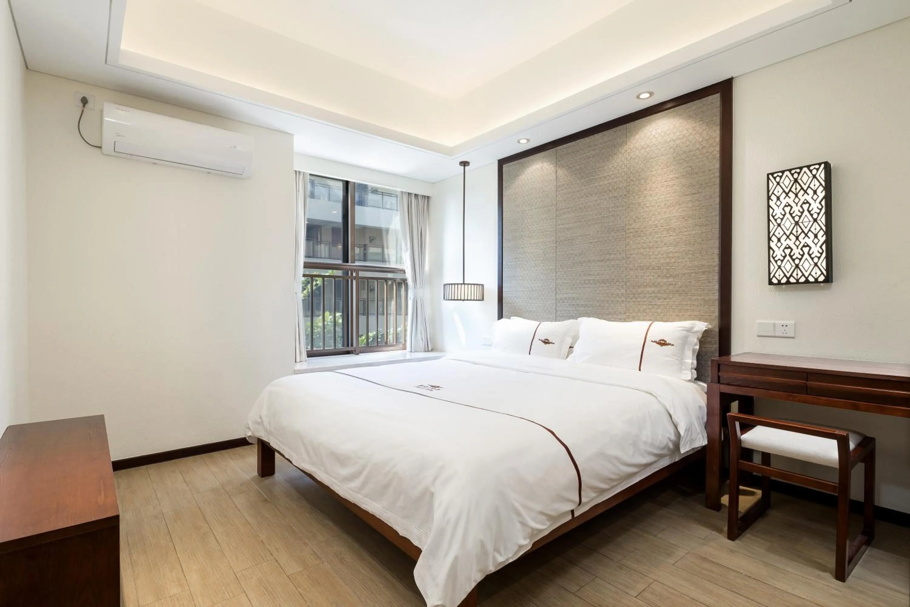 Bed in Iccssi Villa Haitang Bay Sanya