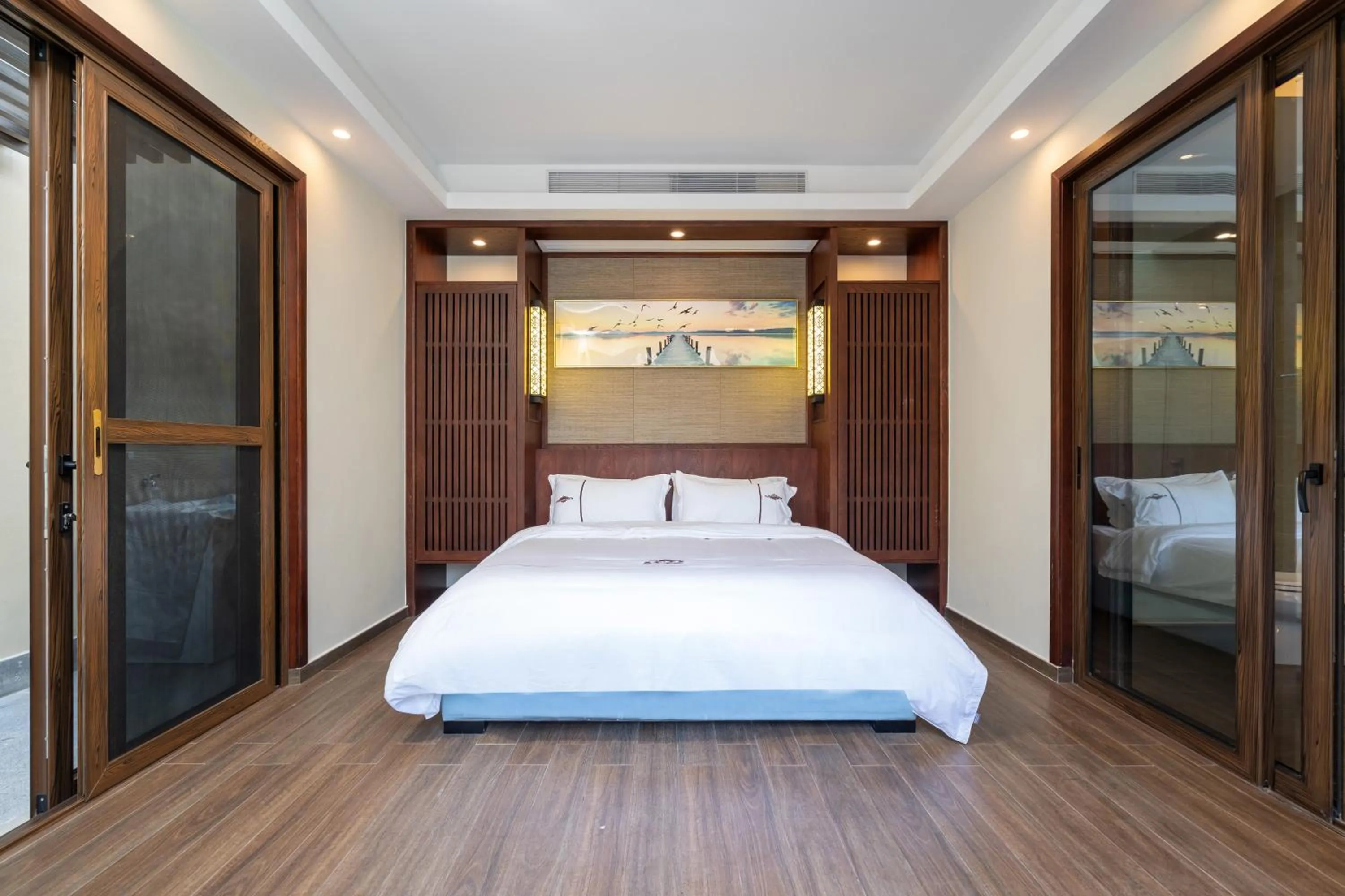 Bed in Iccssi Villa Haitang Bay Sanya