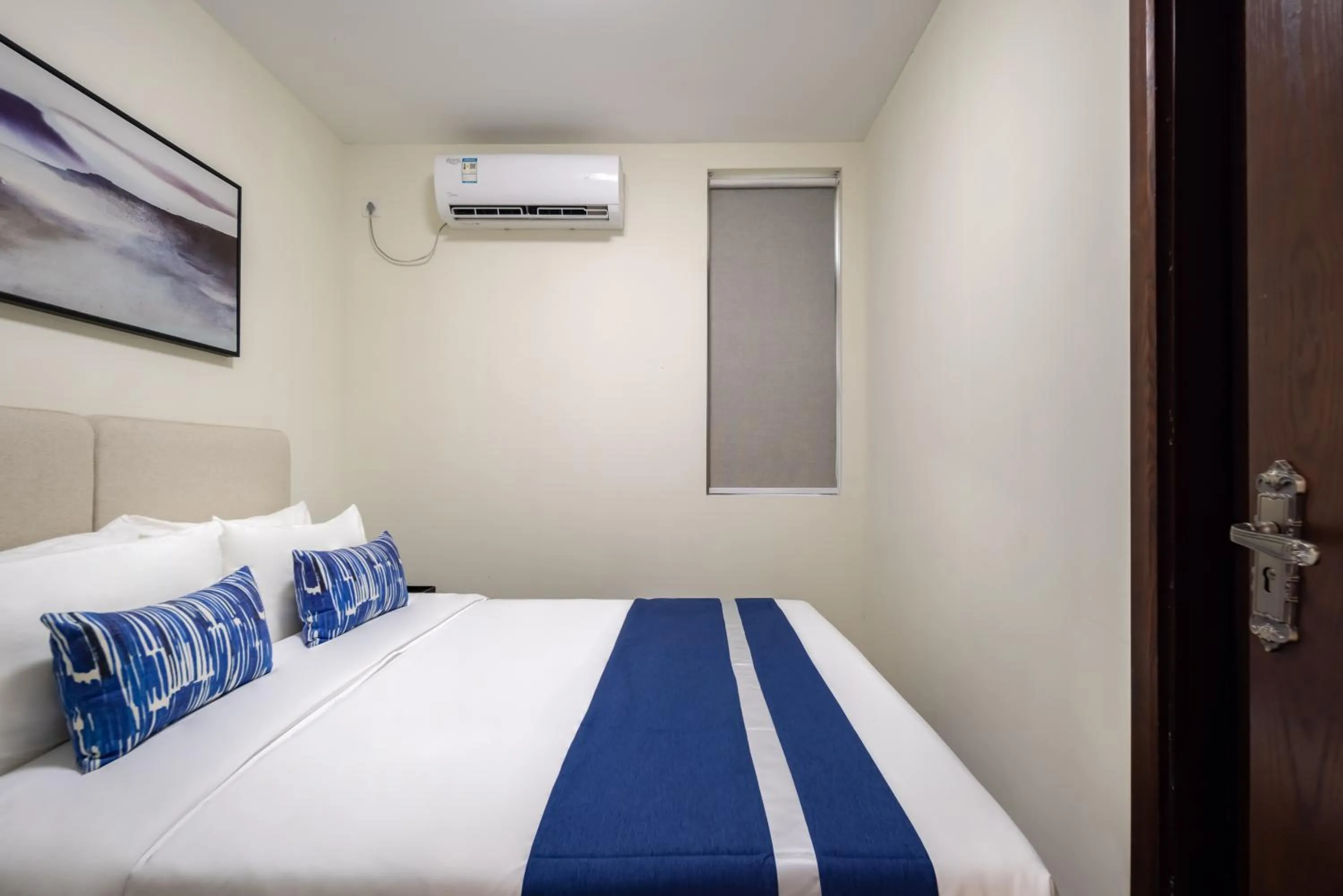 Bed in Iccssi Villa Haitang Bay Sanya