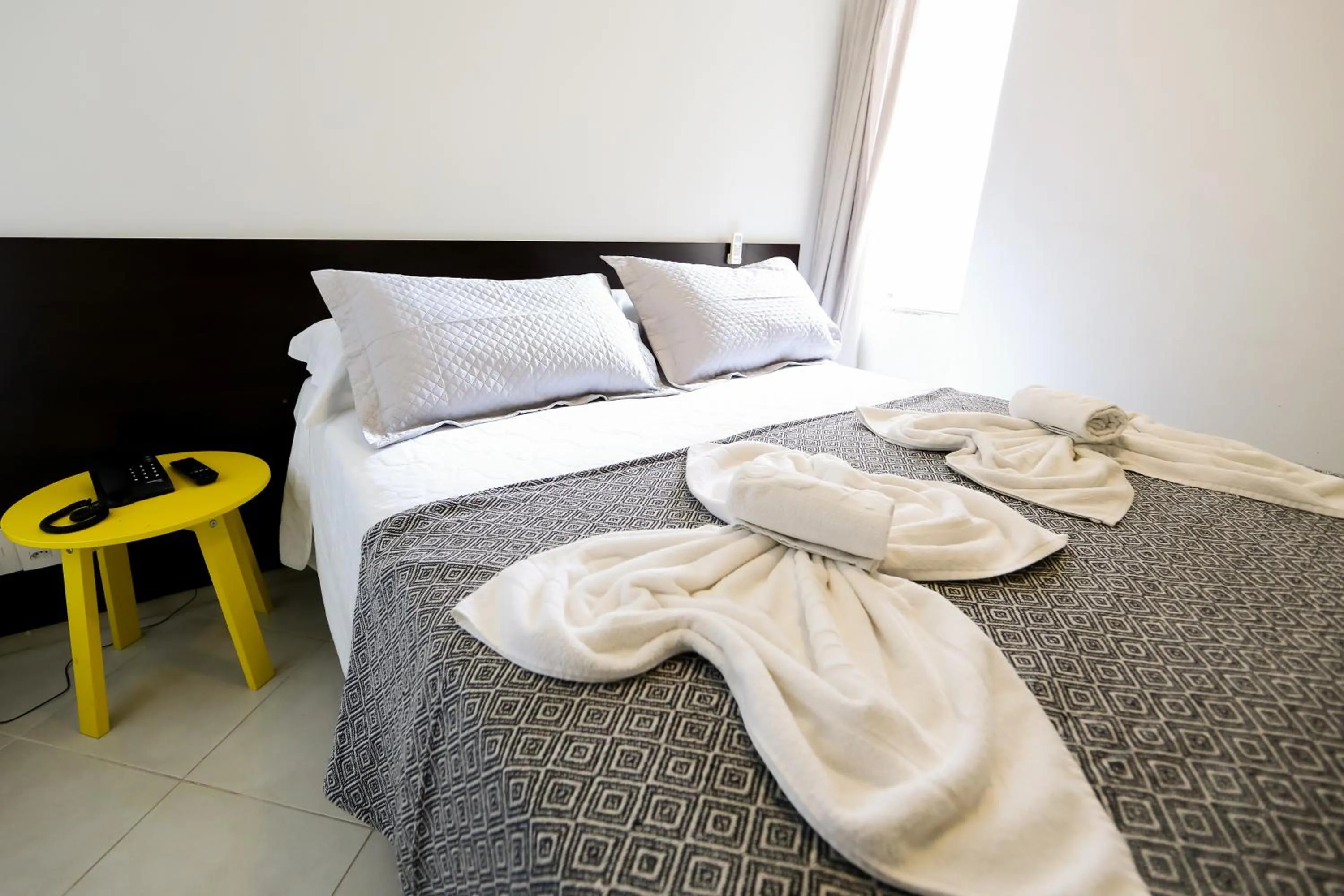 Bed in Das Nações Hotel