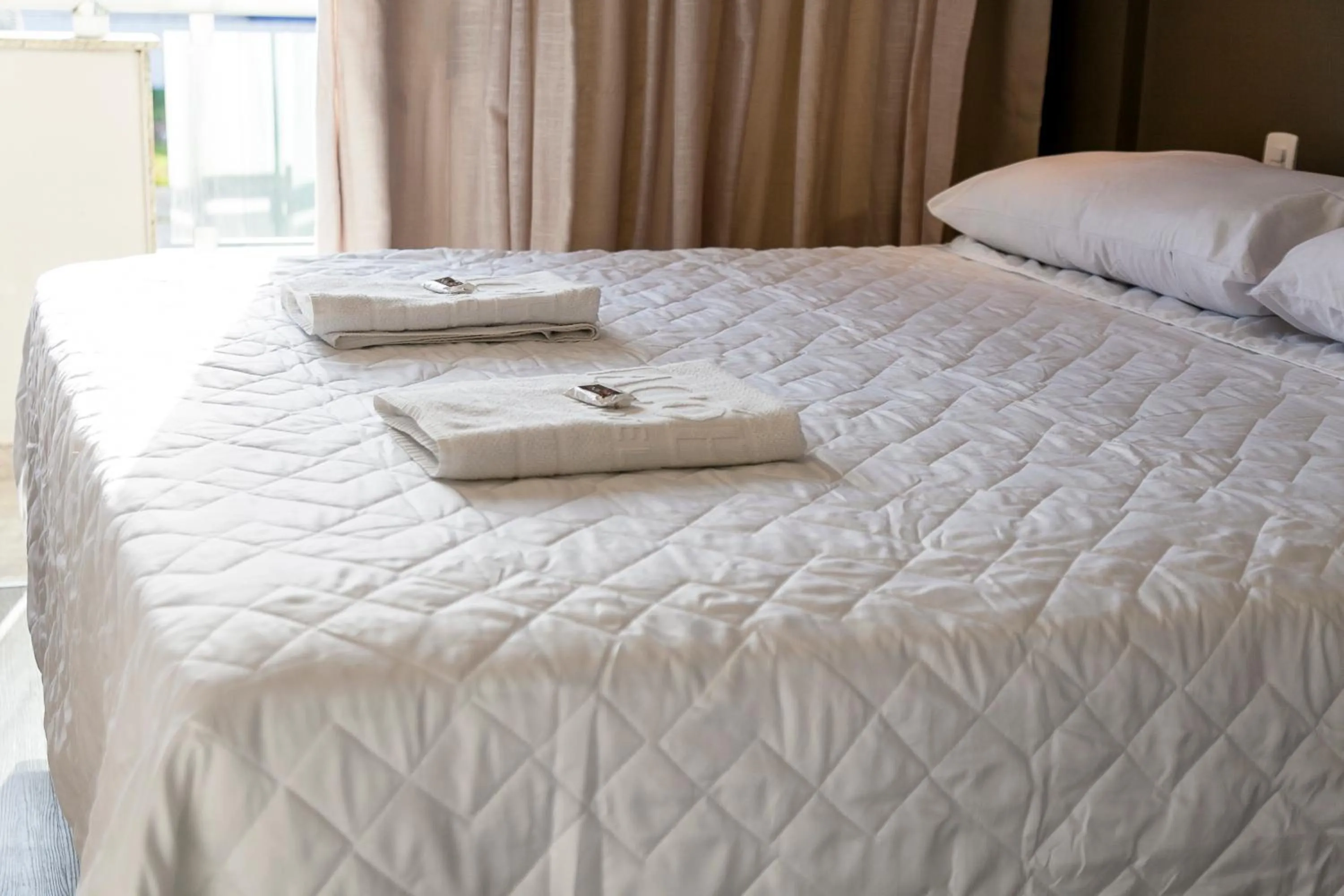 Bed in Das Nações Hotel