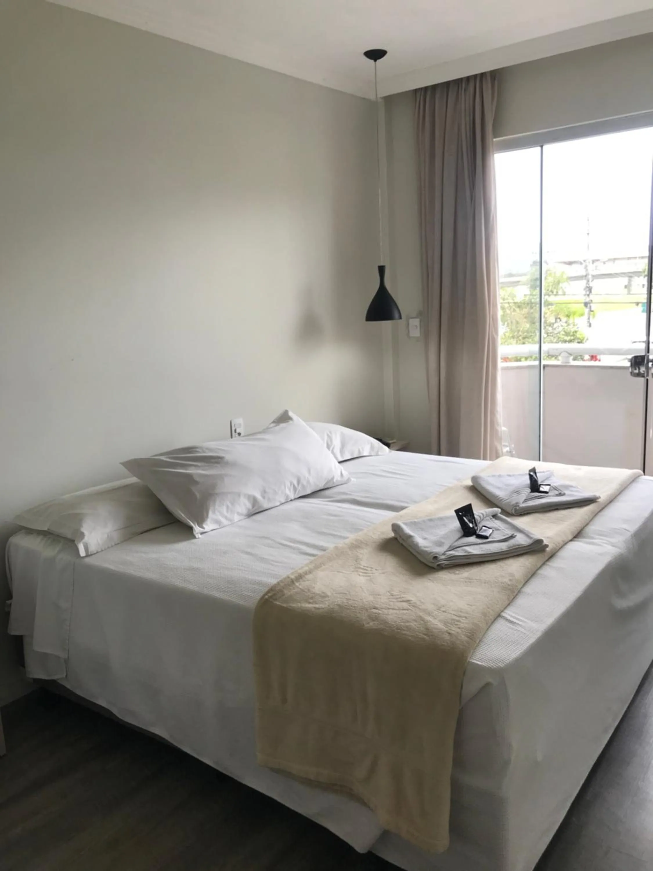 Bed in Das Nações Hotel