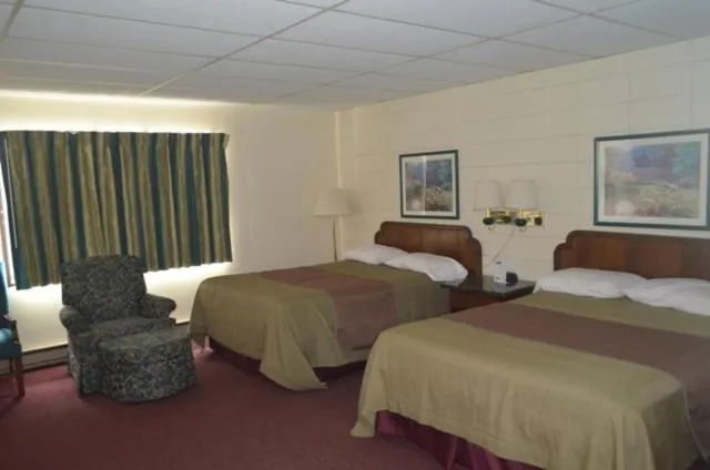 Bed in Grand Inn Fargo