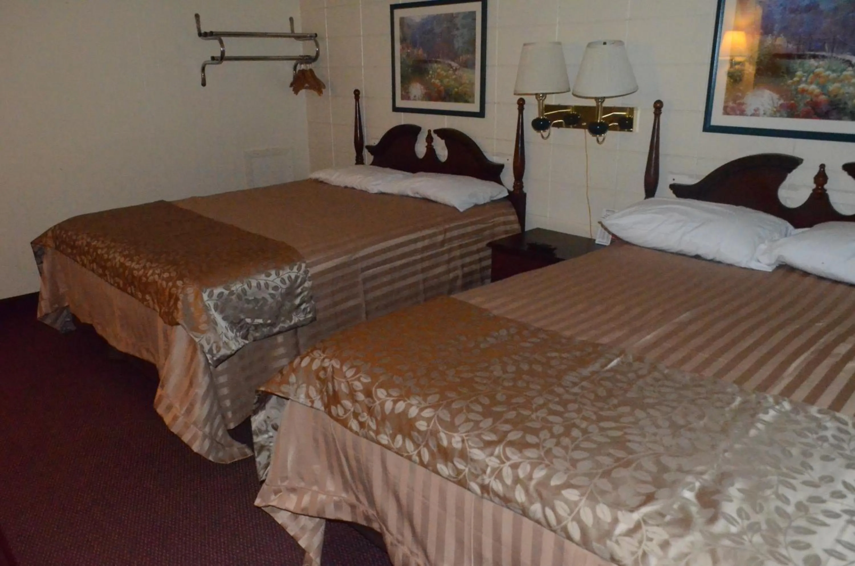 Bed in Grand Inn Fargo