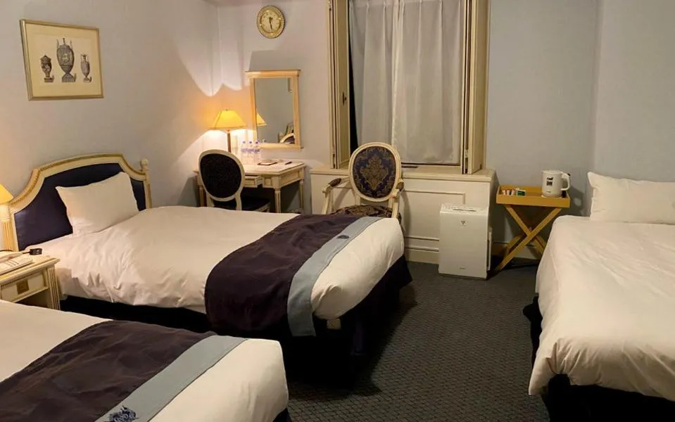 Bed in Hotel Monterey Osaka