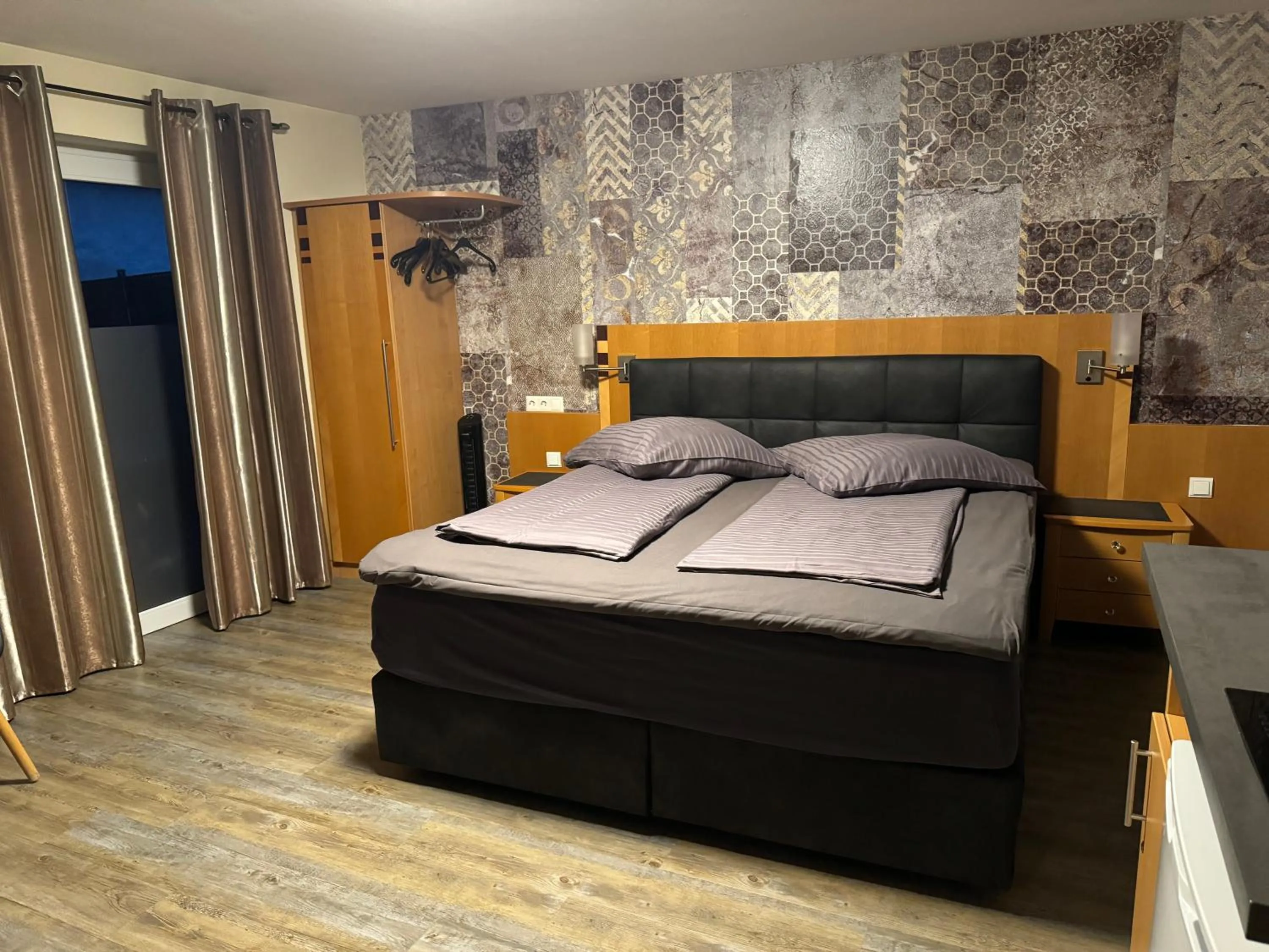 Bed in Hotel Mythos "rooms with kitchenette- apartments with kitchen"