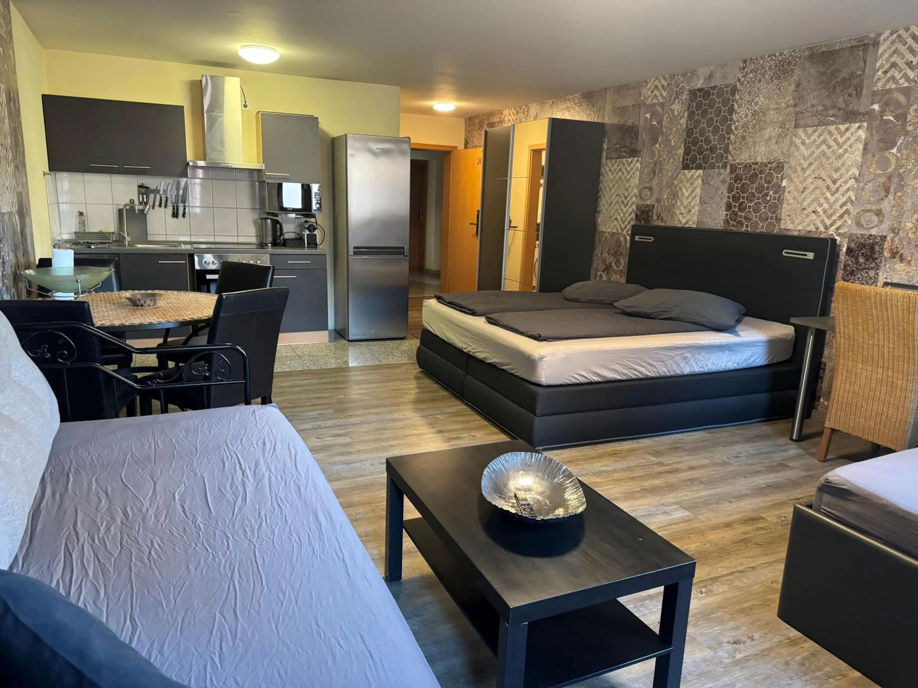 Bed in Hotel Mythos "rooms with kitchenette- apartments with kitchen"