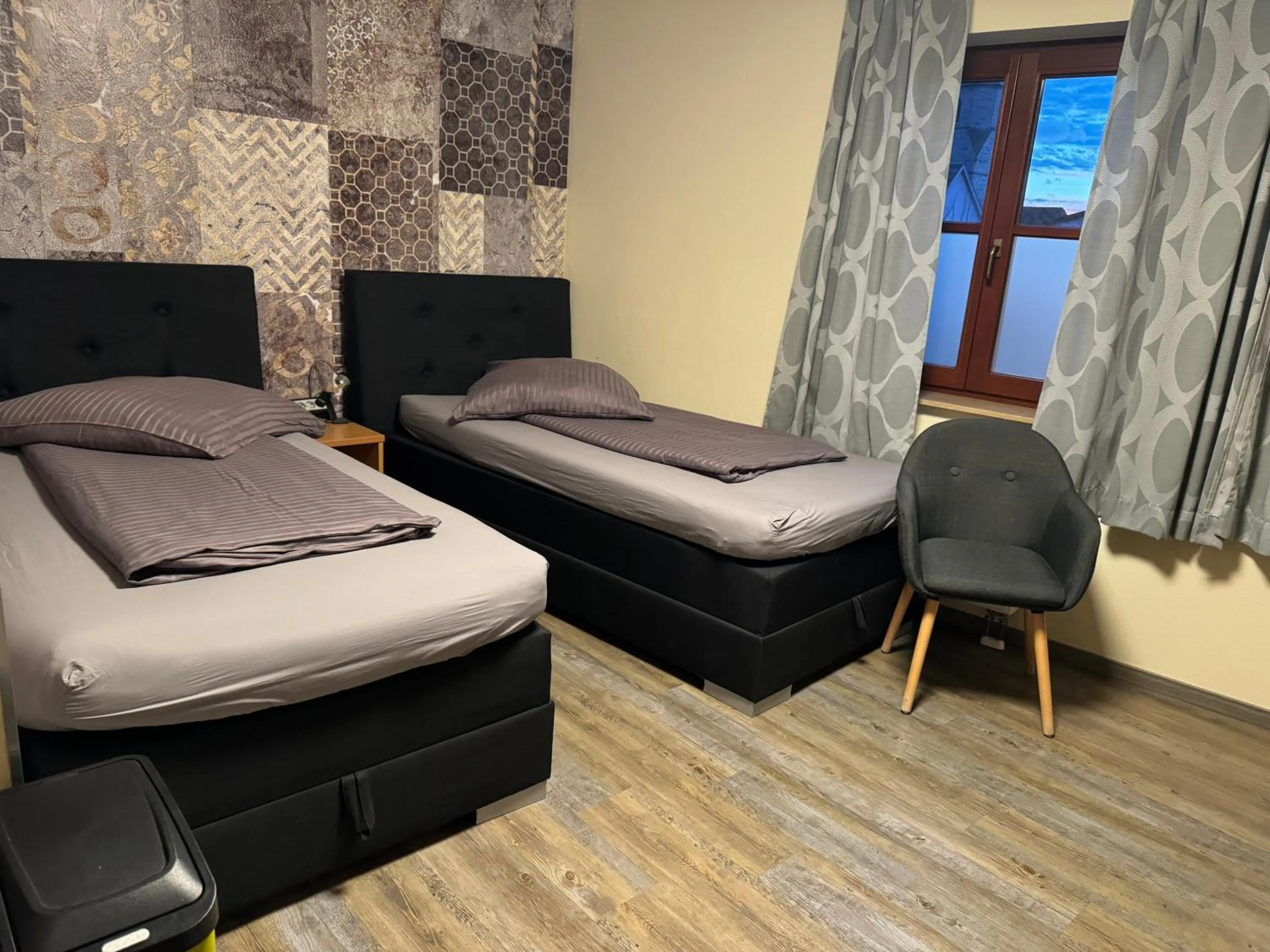 Bed in Hotel Mythos "rooms with kitchenette- apartments with kitchen"