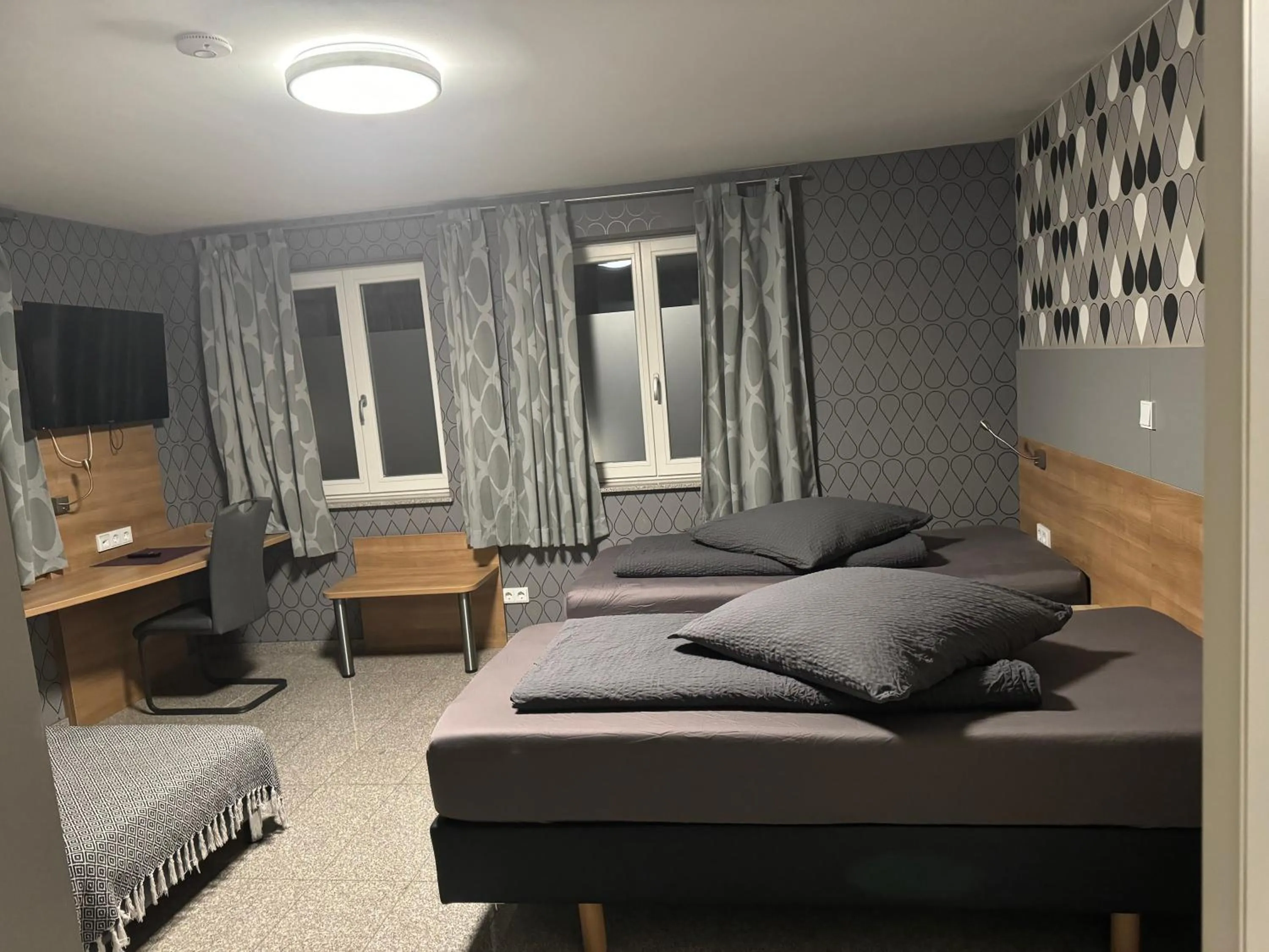 Bed in Hotel Mythos "rooms with kitchenette- apartments with kitchen"