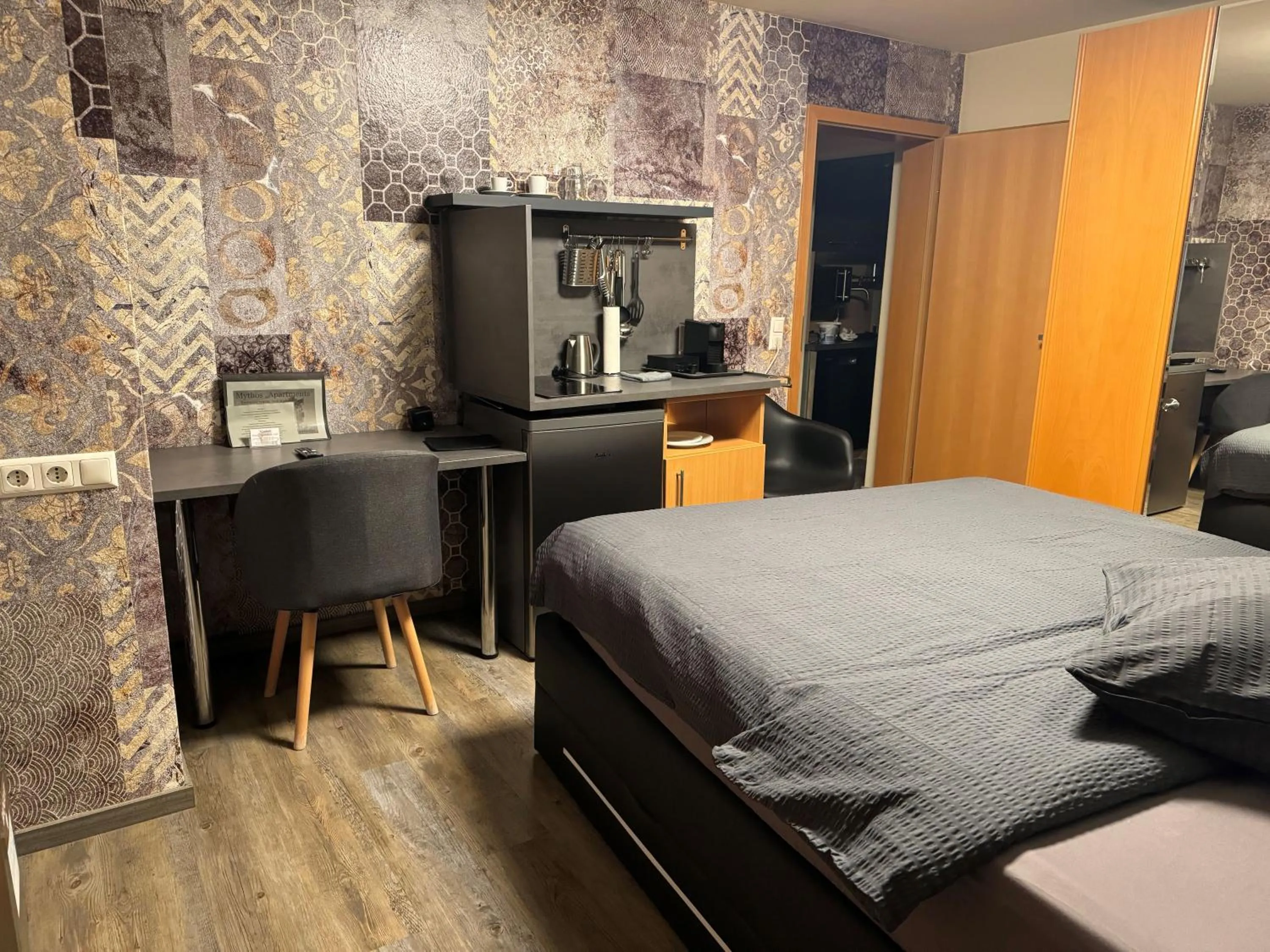 Bed in Hotel Mythos "rooms with kitchenette- apartments with kitchen"