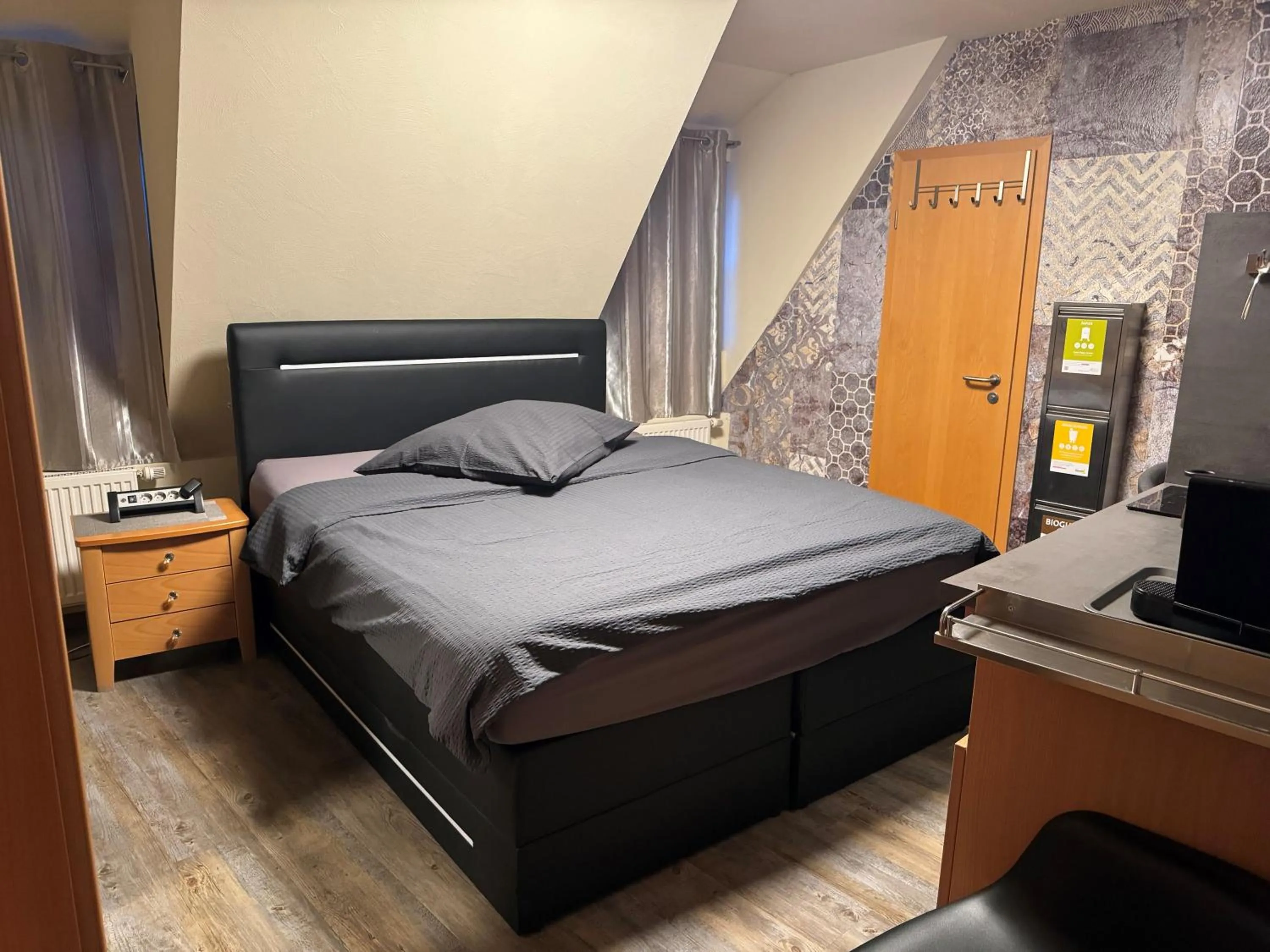 Bed in Hotel Mythos "rooms with kitchenette- apartments with kitchen"