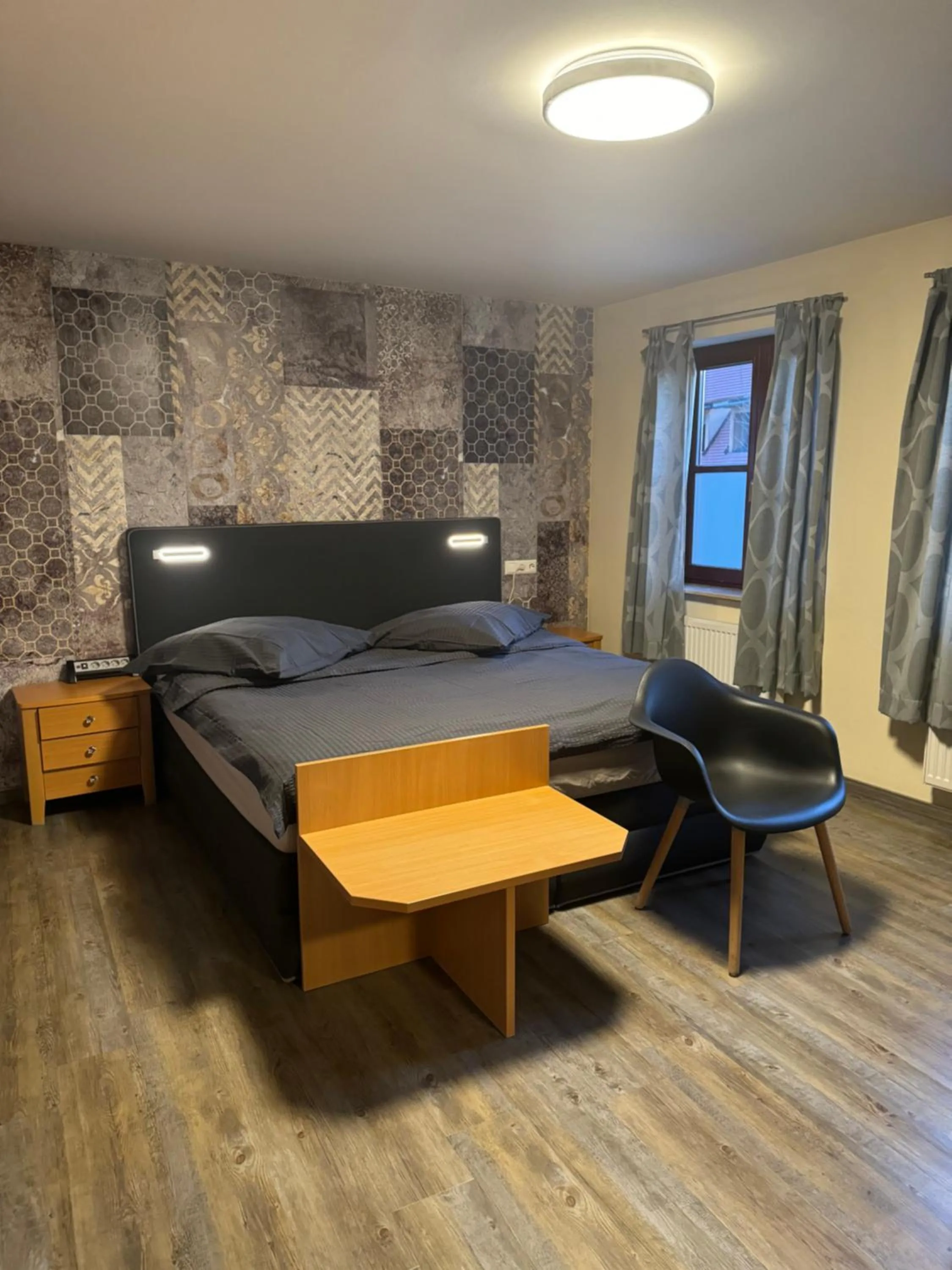 Bed in Hotel Mythos "rooms with kitchenette- apartments with kitchen"