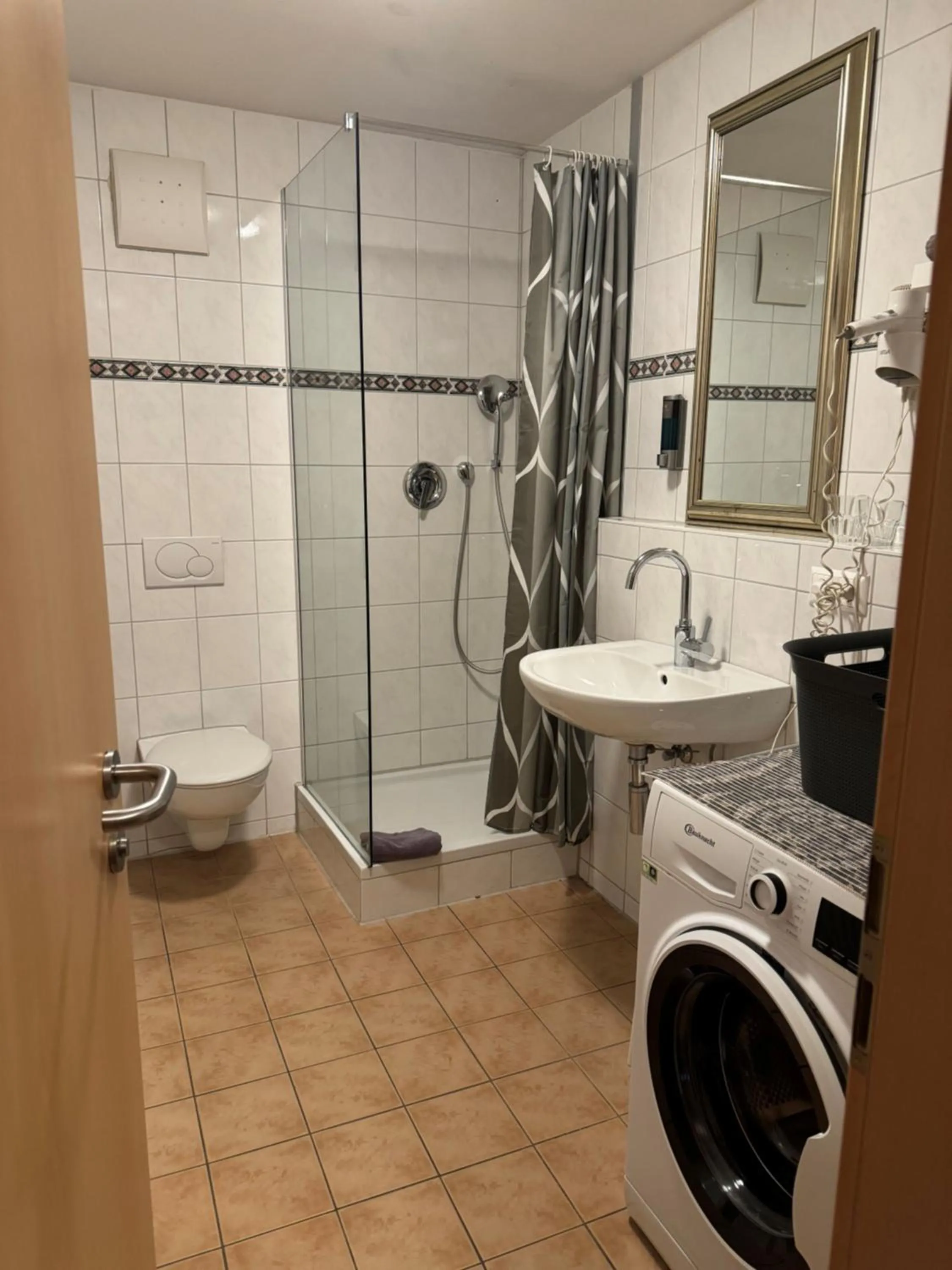 Shower in Hotel Mythos "rooms with kitchenette- apartments with kitchen"