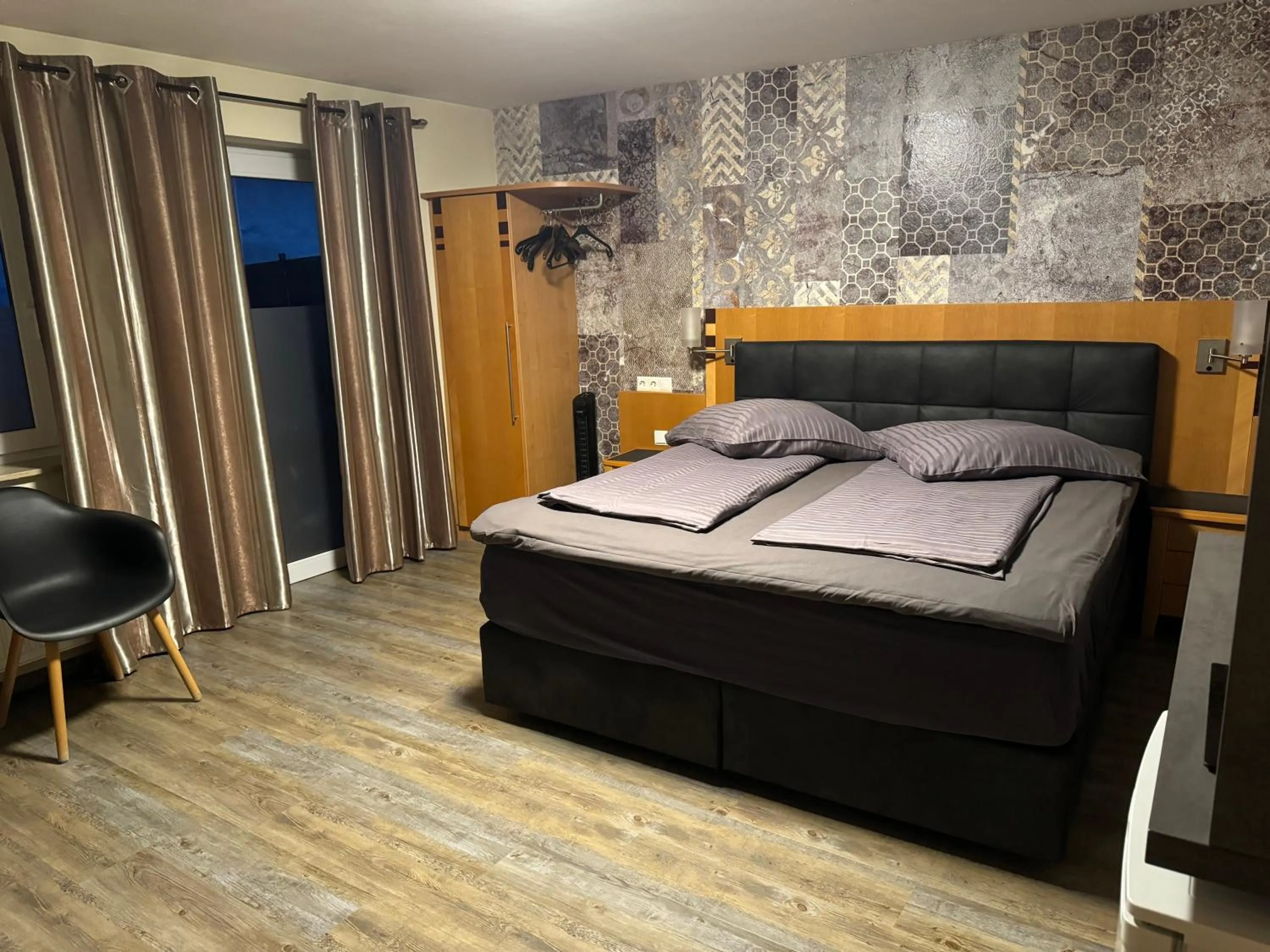 Bed in Hotel Mythos "rooms with kitchenette- apartments with kitchen"