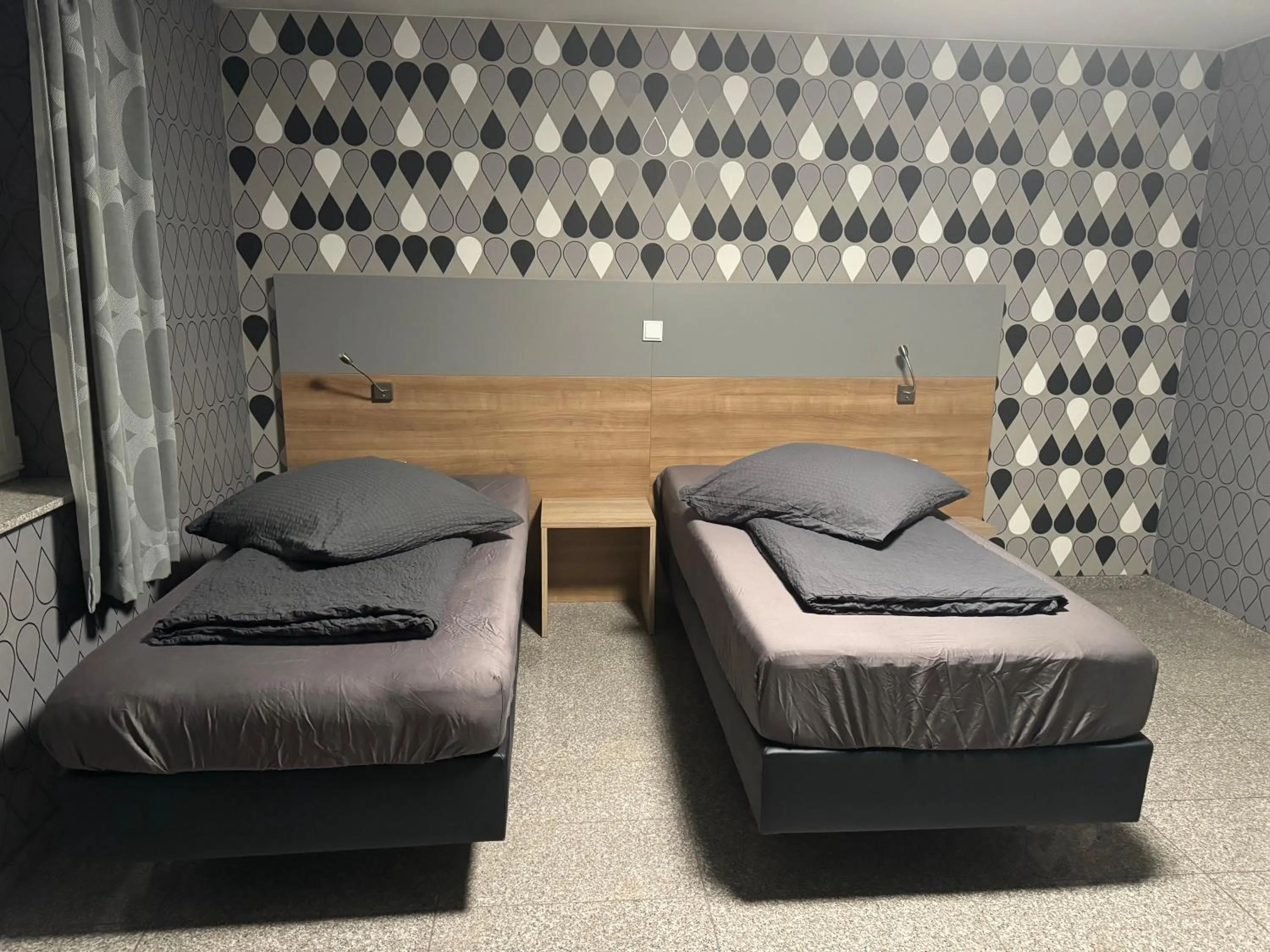 Bed in Hotel Mythos "rooms with kitchenette- apartments with kitchen"