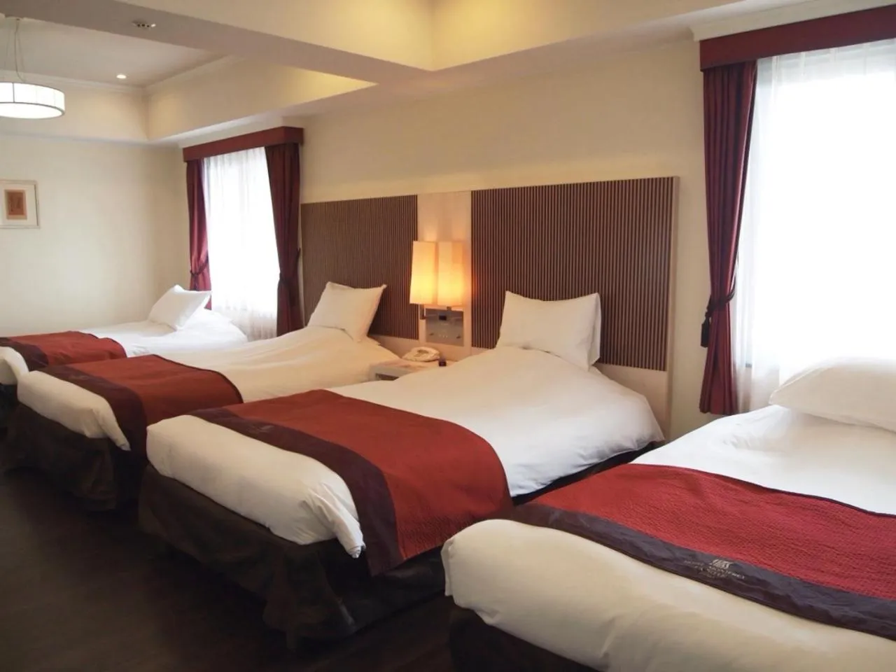 Bed in Hotel Monterey La Soeur Osaka