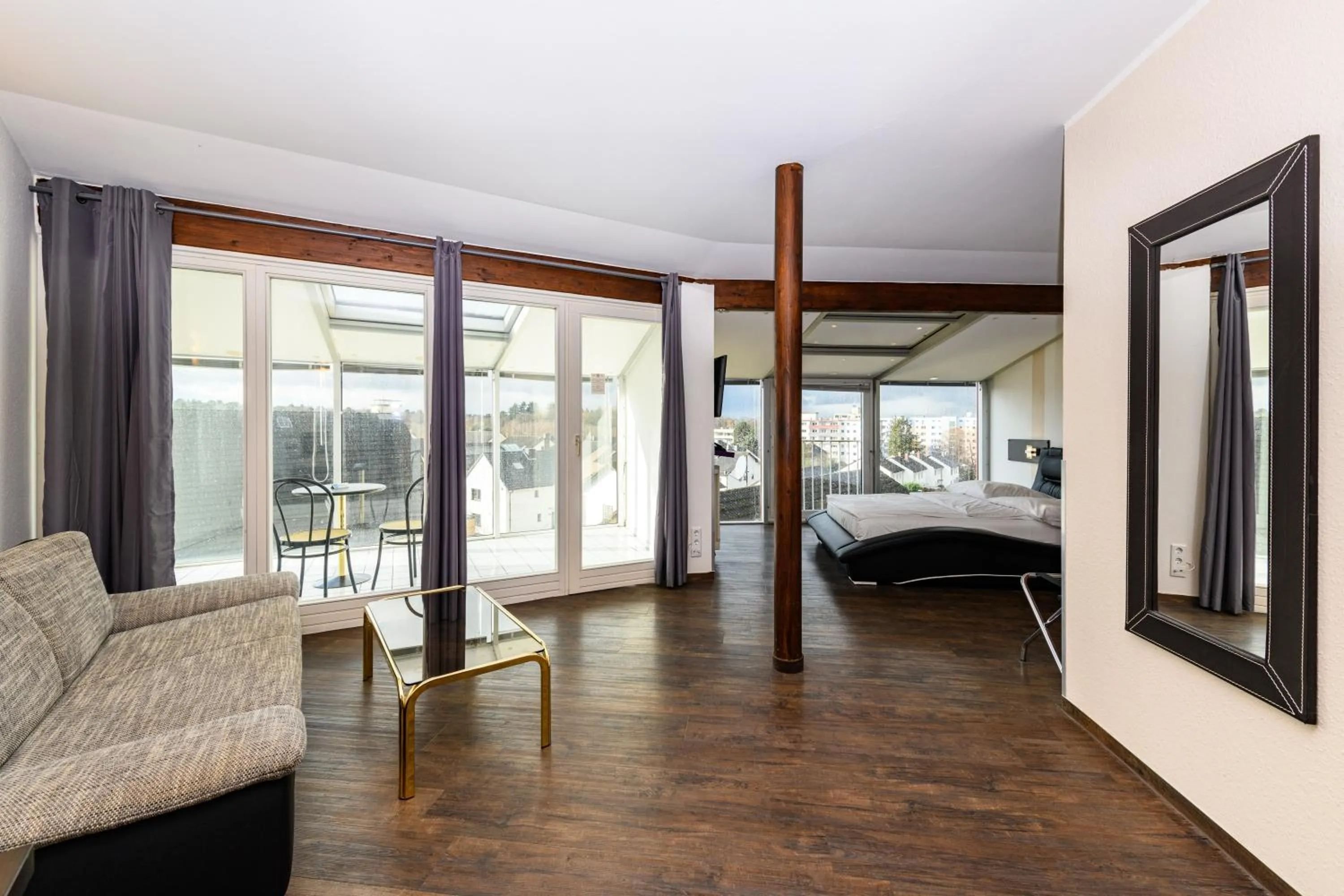 Photo of the whole room, Bed in Turmhotel Rhein-Main