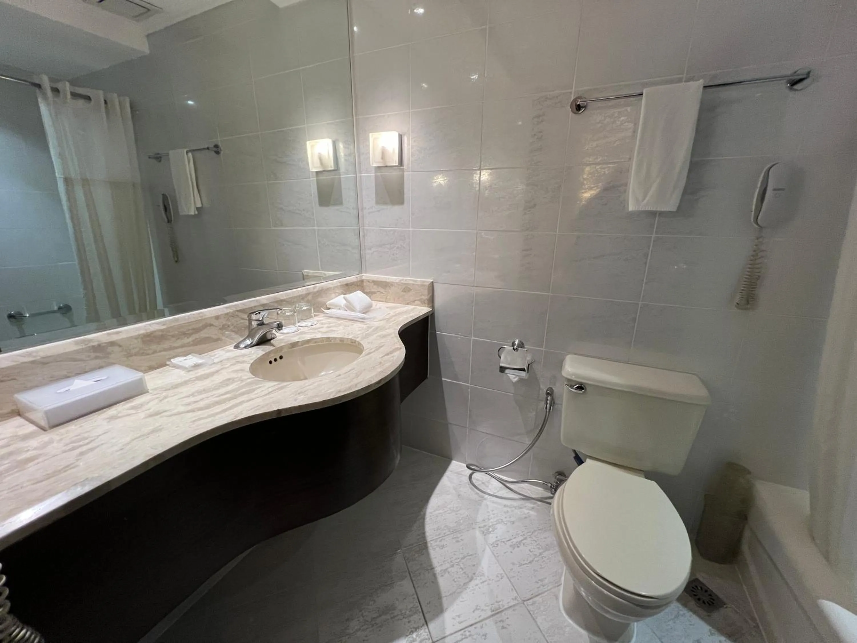 Bed in City Garden Hotel Makati