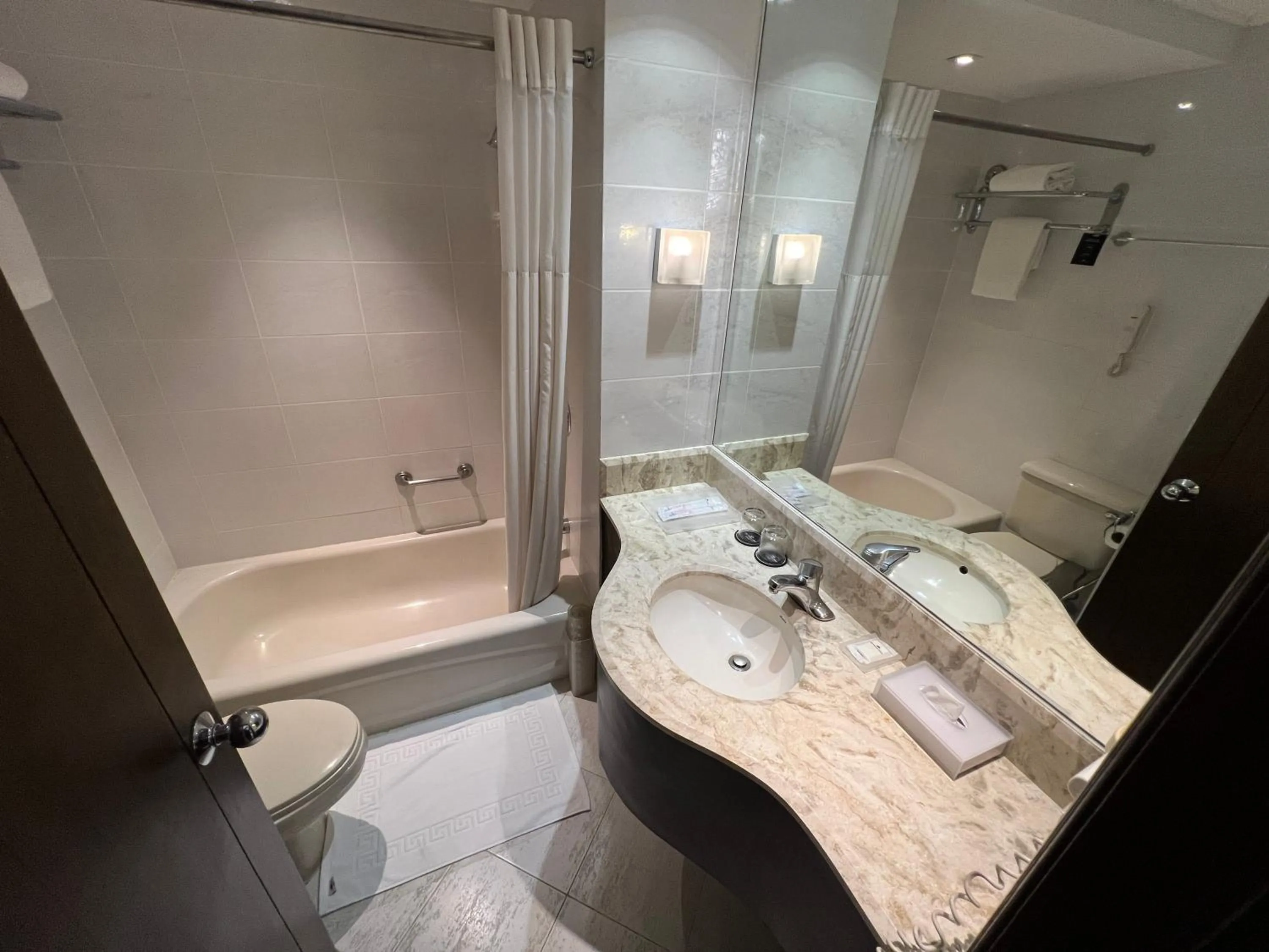 Bedroom in City Garden Hotel Makati