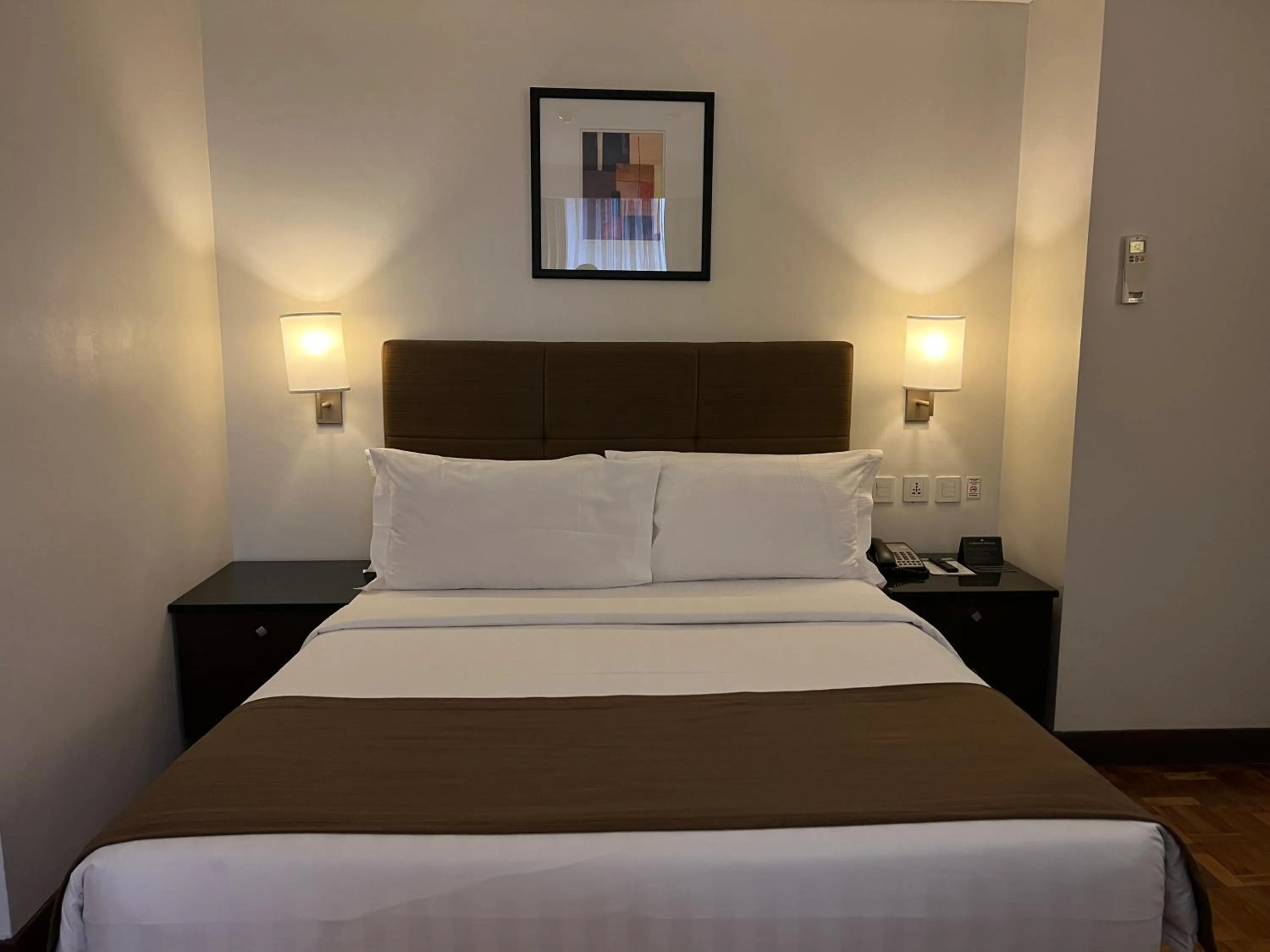 Bed in City Garden Hotel Makati