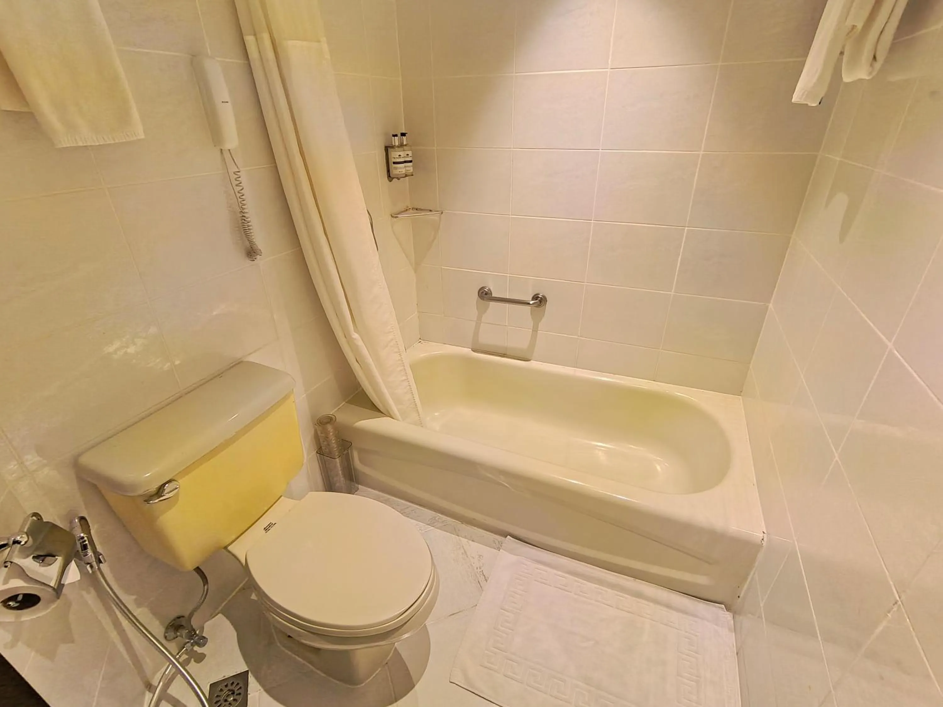 Bedroom in City Garden Hotel Makati