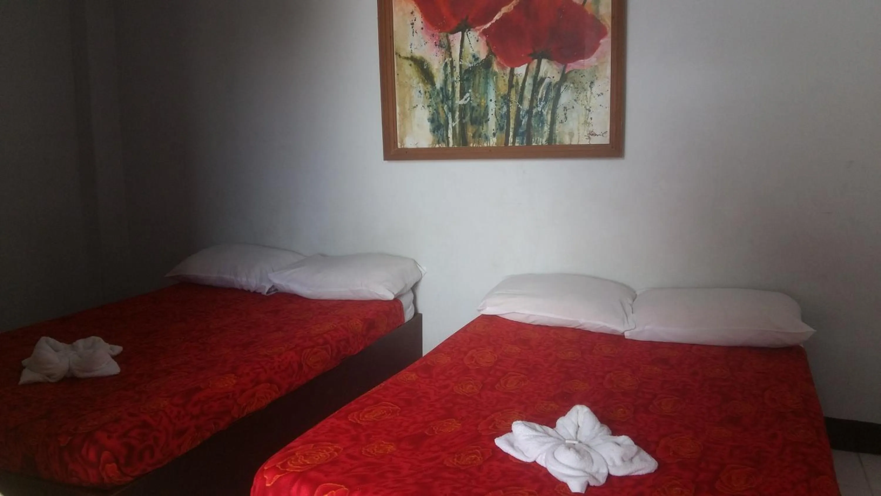 Bed in Antonio's Pension House