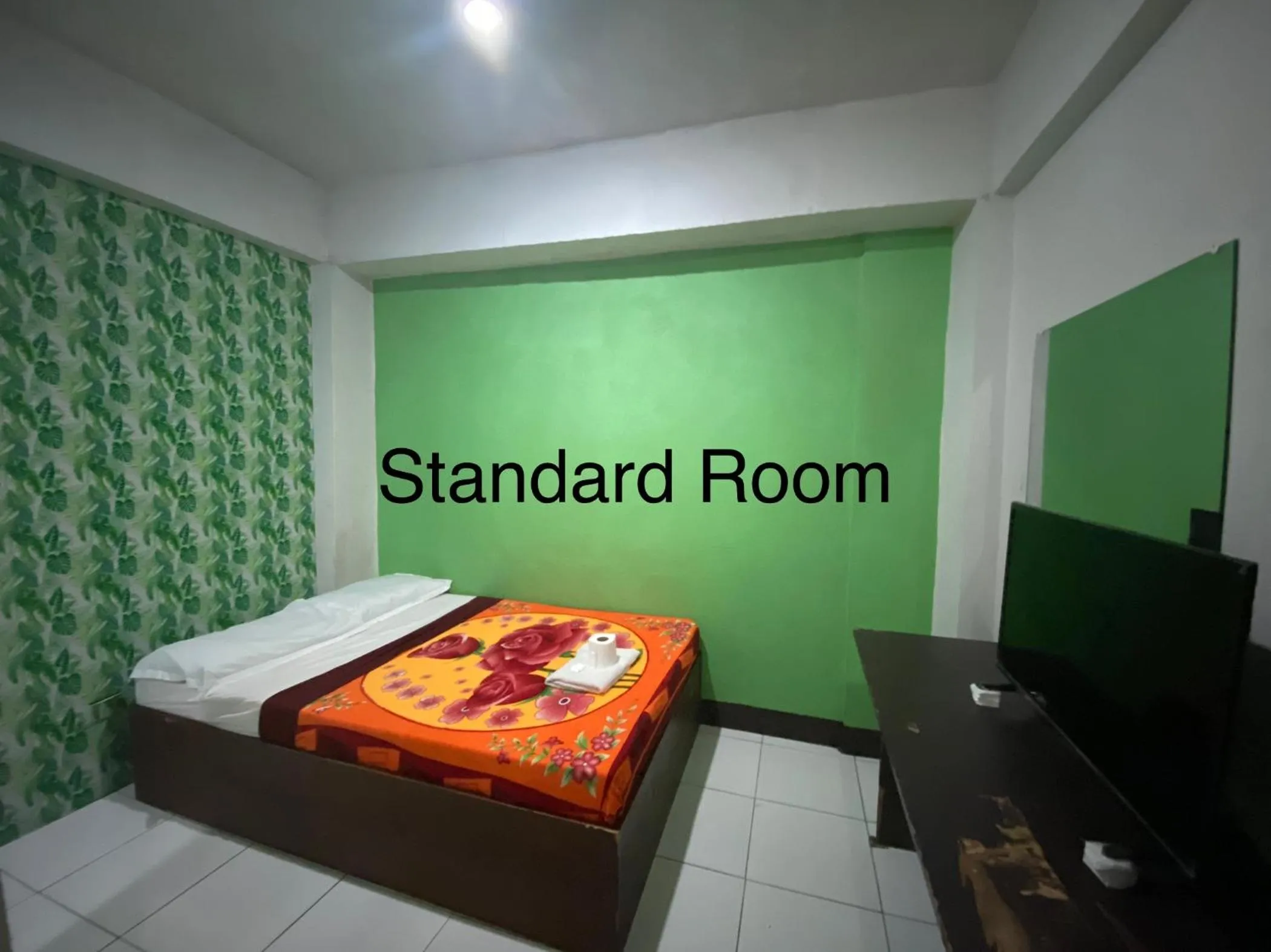 Bed in Antonio's Pension House