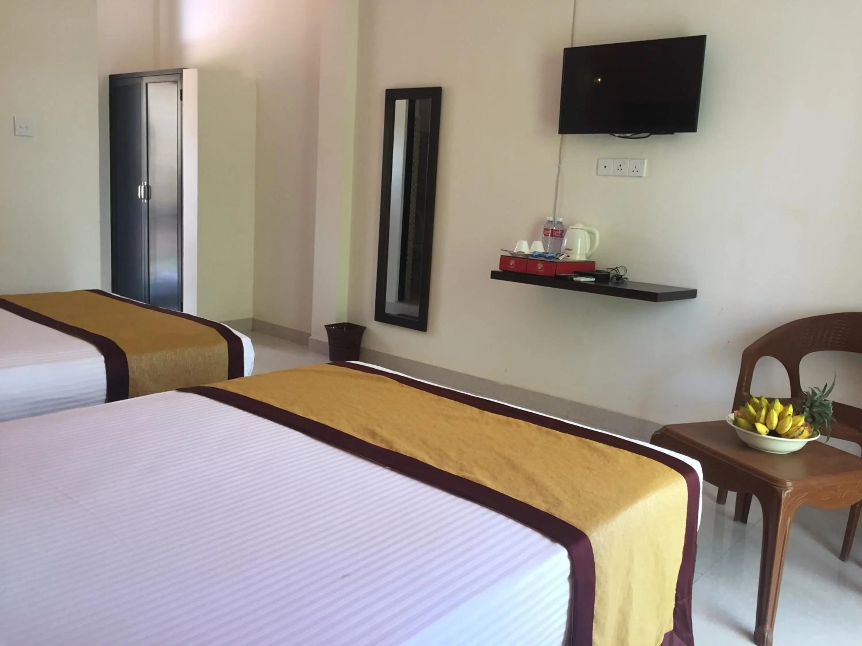 Bed in Organic Garden Resort Sigiriya