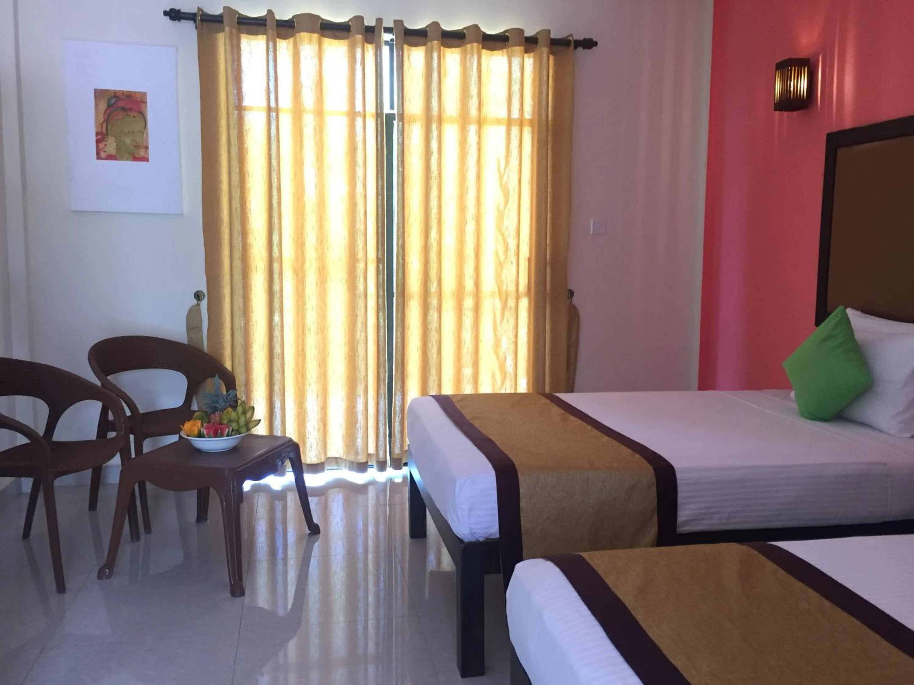 Bed in Organic Garden Resort Sigiriya