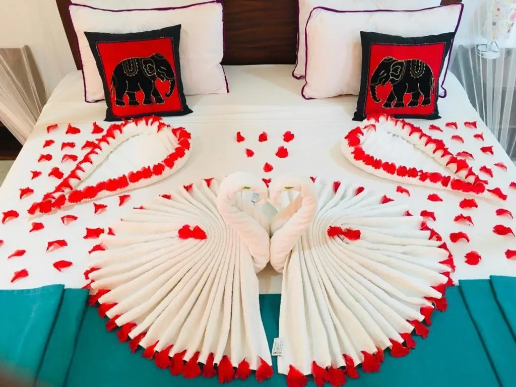 Bed in Organic Garden Resort Sigiriya