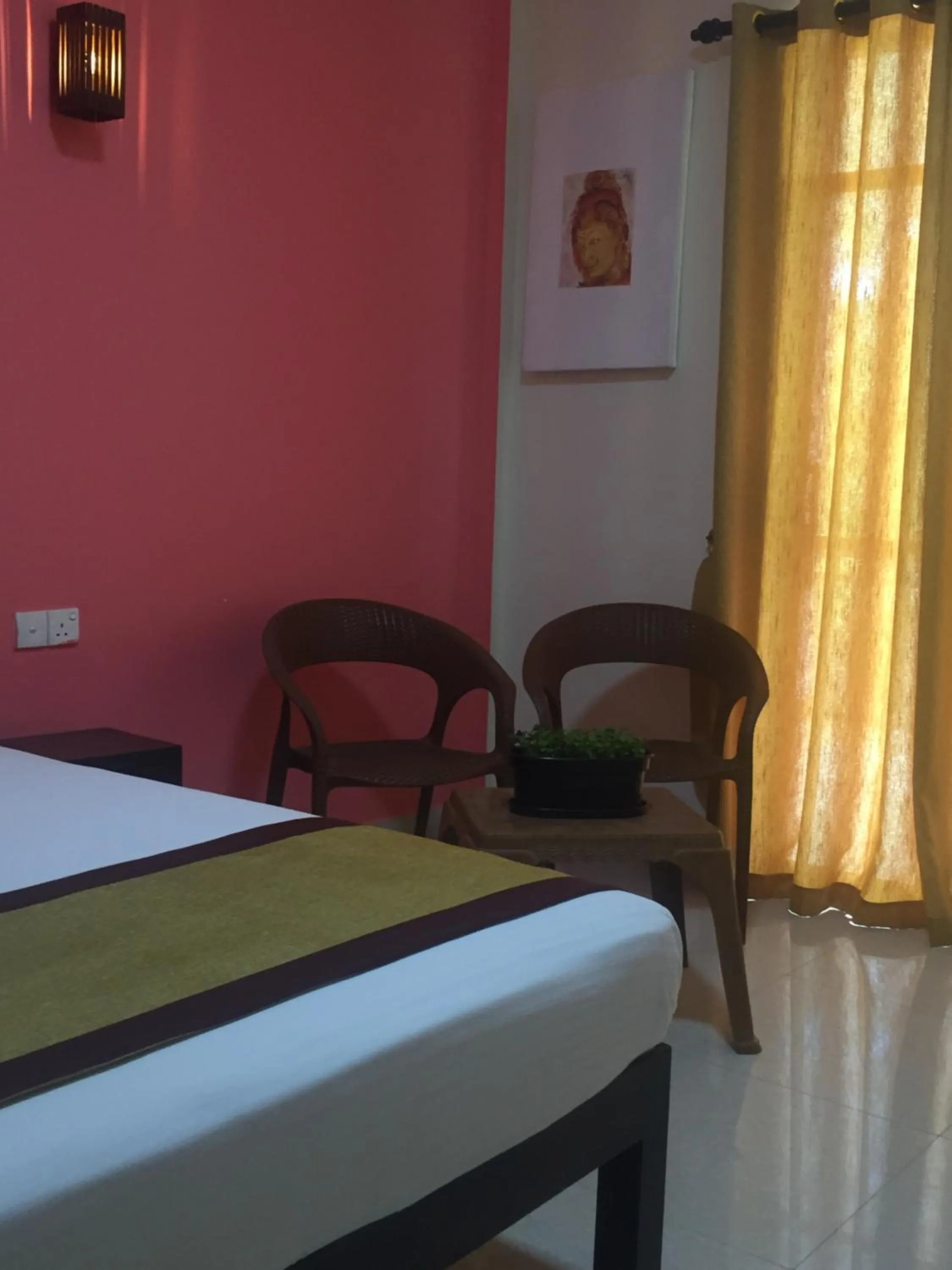 Bed in Organic Garden Resort Sigiriya