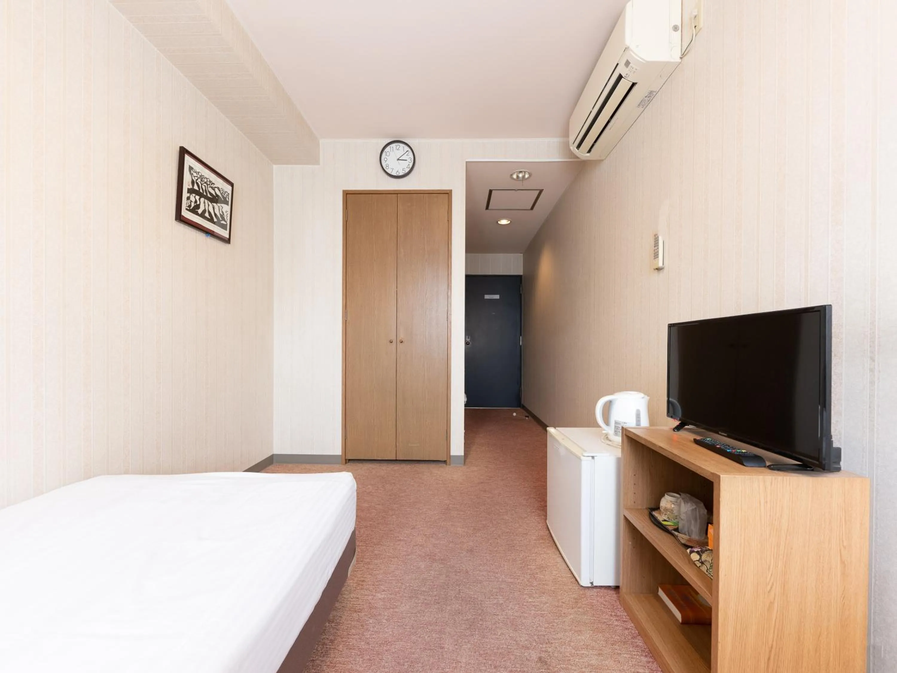 Bed in Tabist Business Hotel R Side Kanazawa