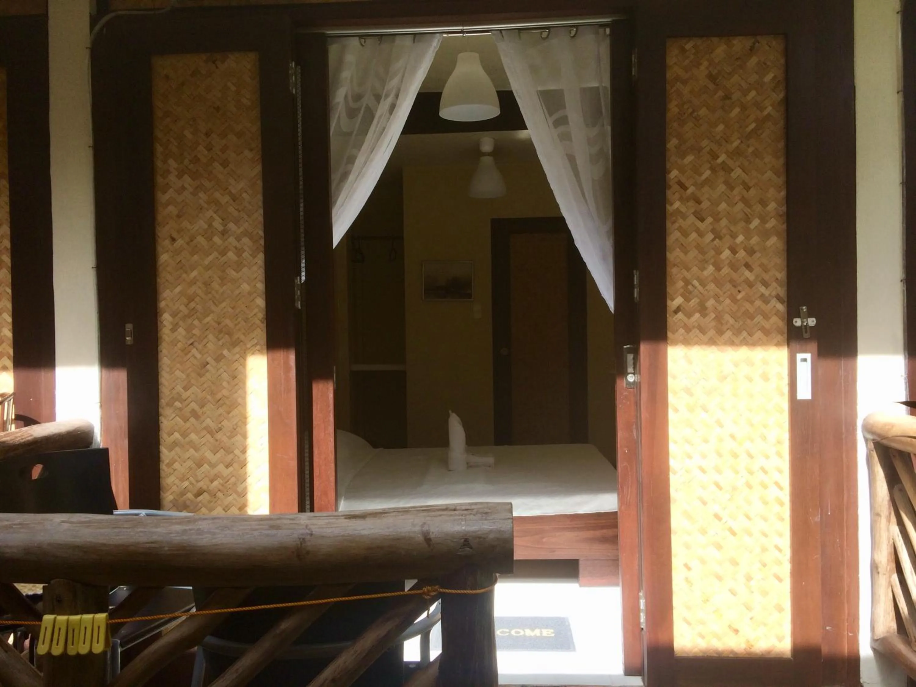 Patio, Bed in Le Cou de Tou Village Resort