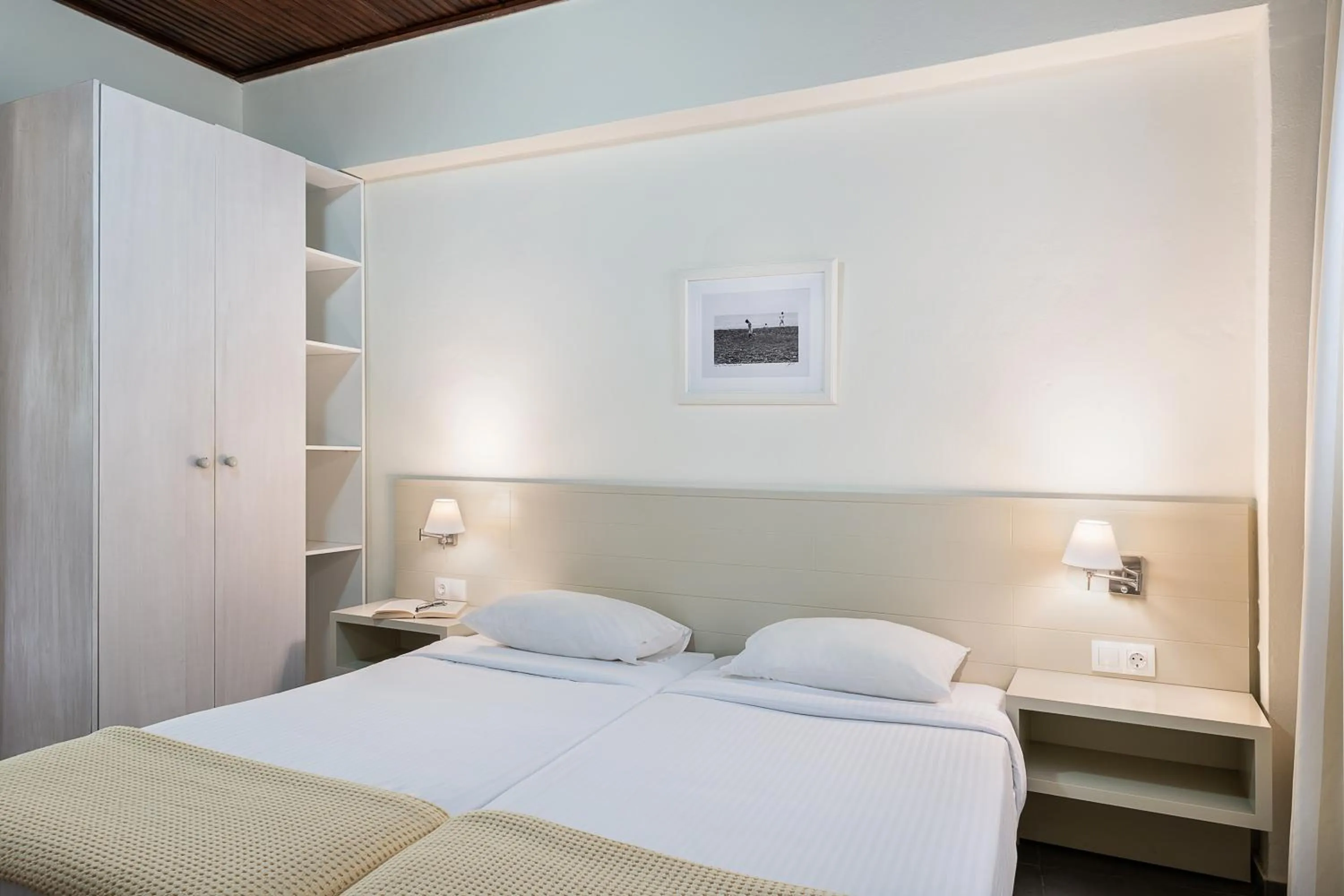 Bed in Magia Apartments