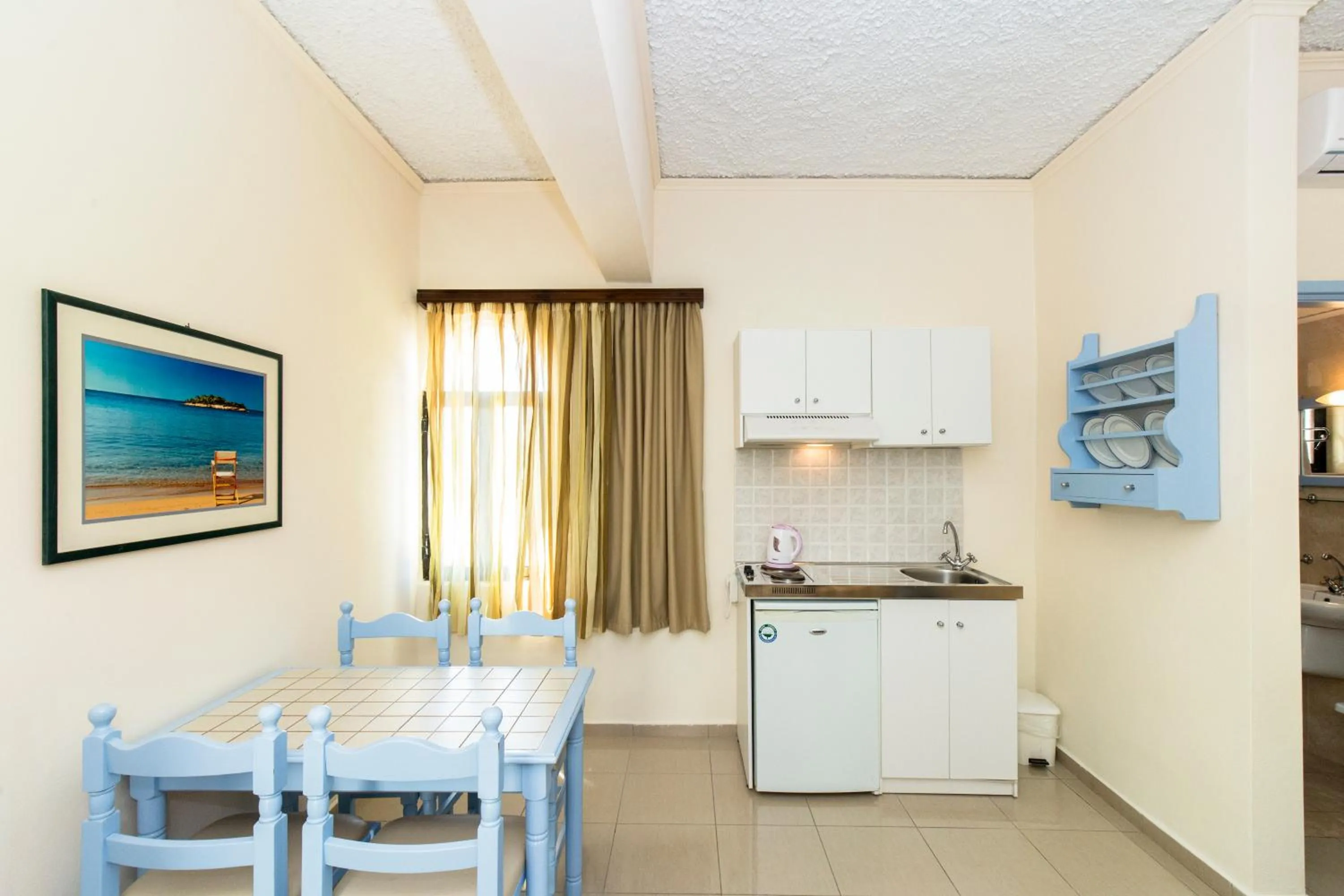 Kitchen or kitchenette in Mandy Suites