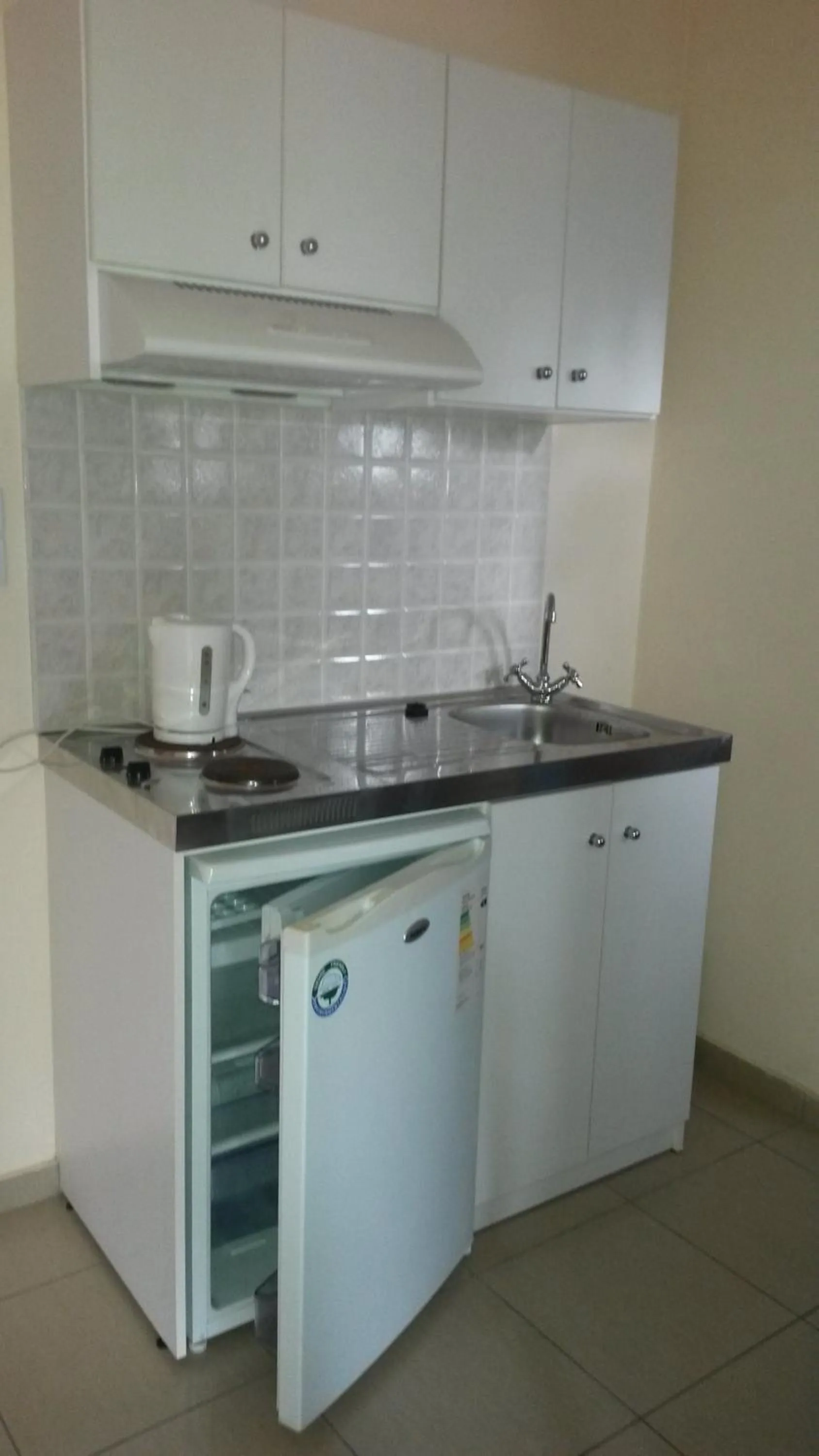 Kitchen or kitchenette in Mandy Suites