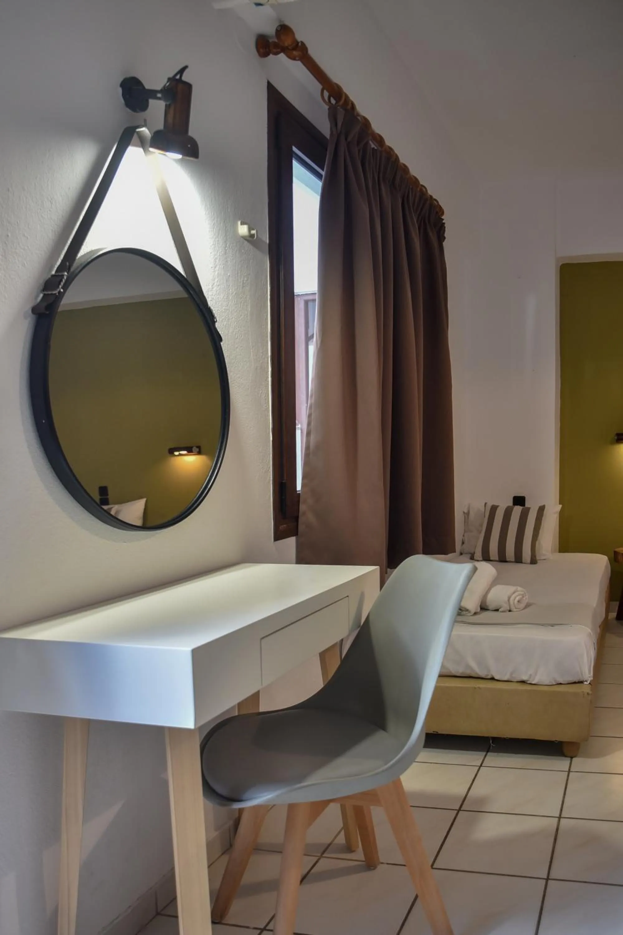 Decorative detail, Bed in Iraklis Apartments