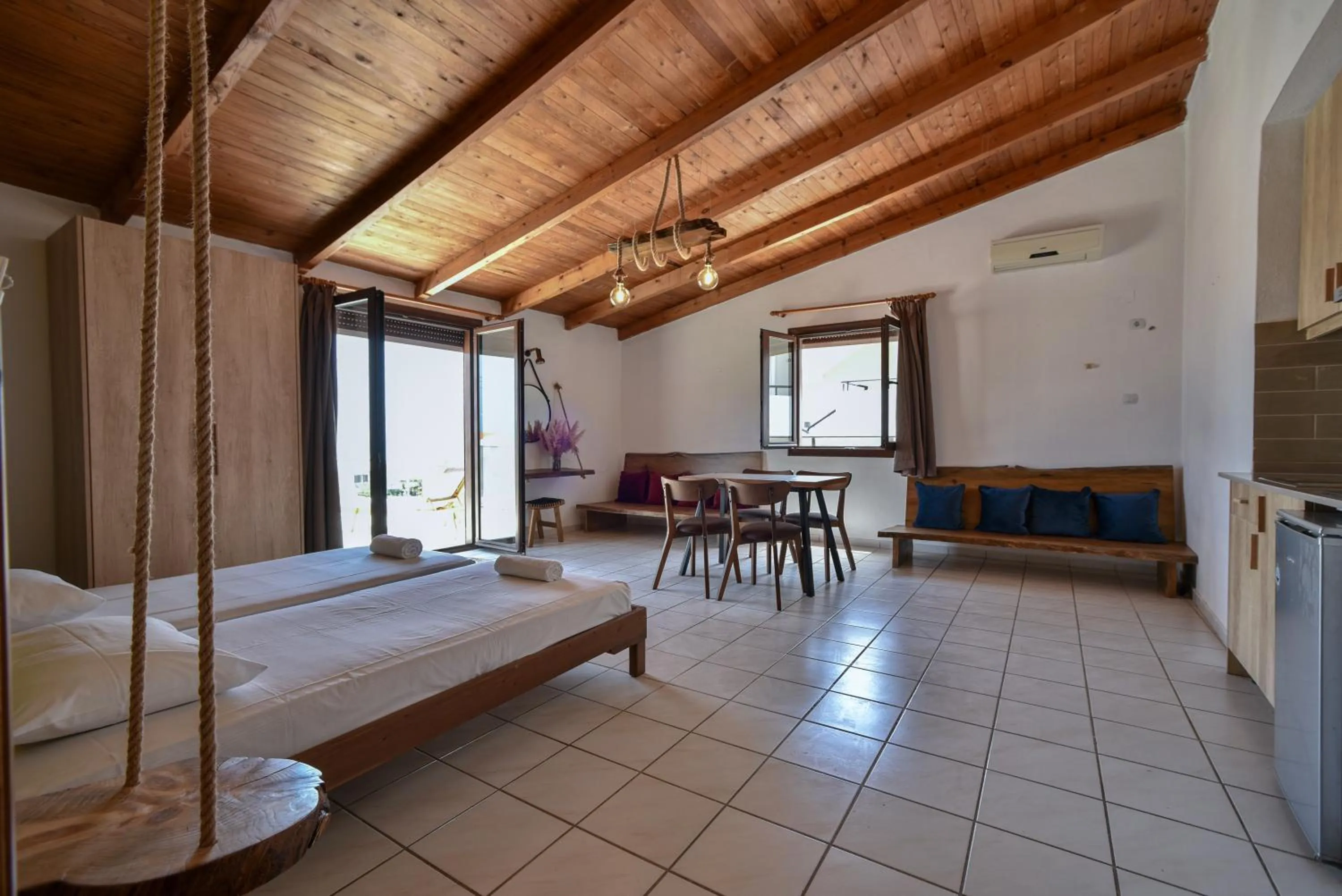 Living room, Bed in Iraklis Apartments