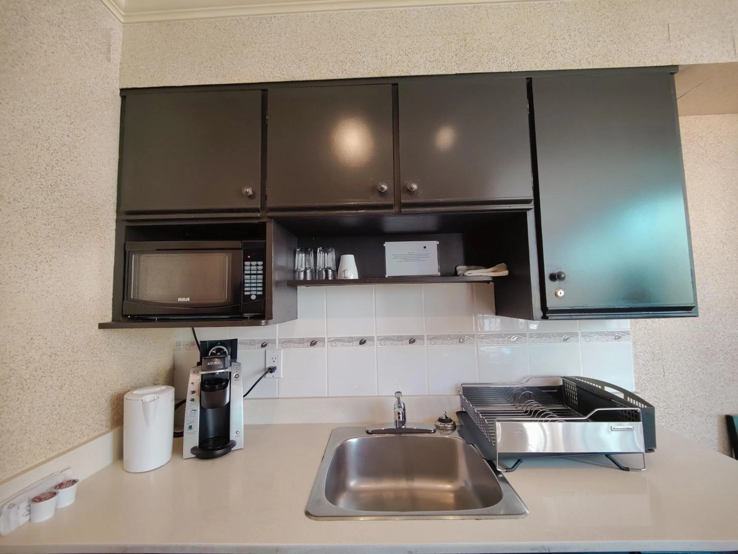 Kitchen or kitchenette in Divya Sutra Suites on Robson Downtown Vancouver