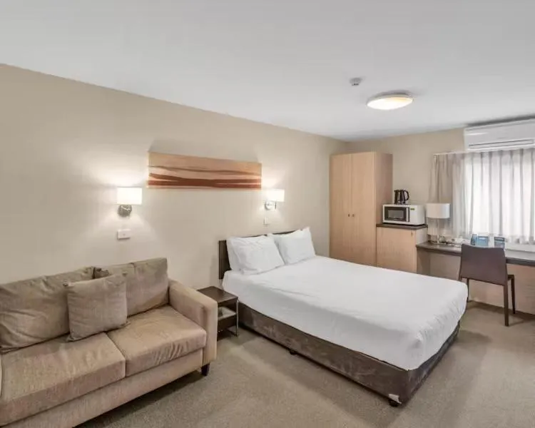 Bed in Tall Trees Ainslie Motel