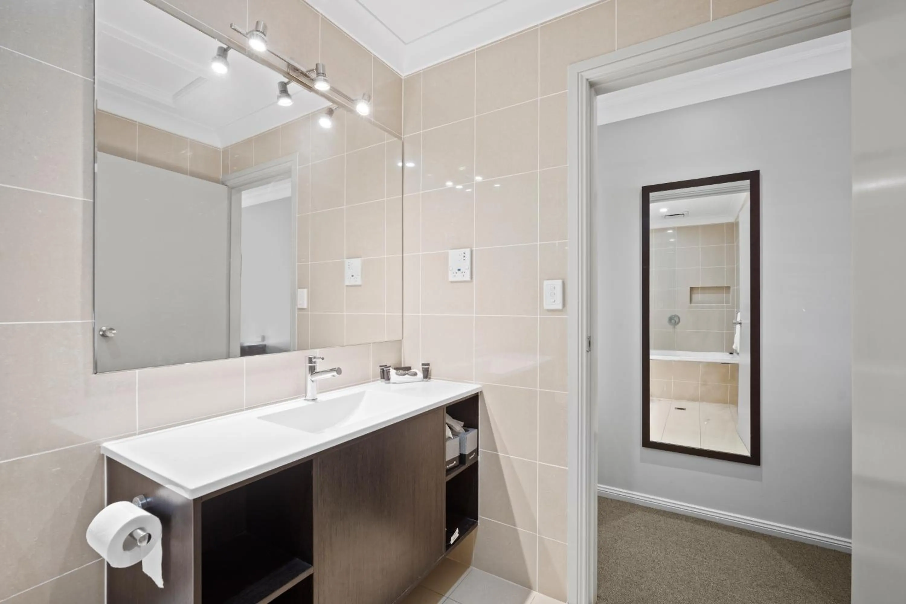 Bathroom in Carlyle Suites & Apartments