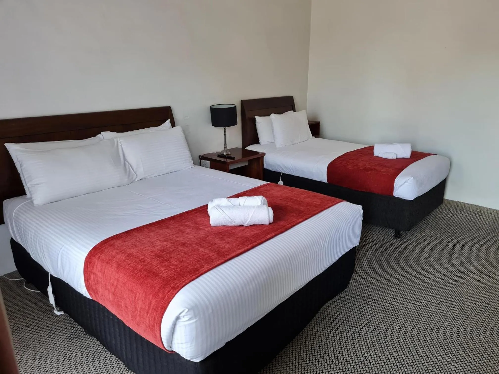 Bed in Seaton Arms Motor Inn