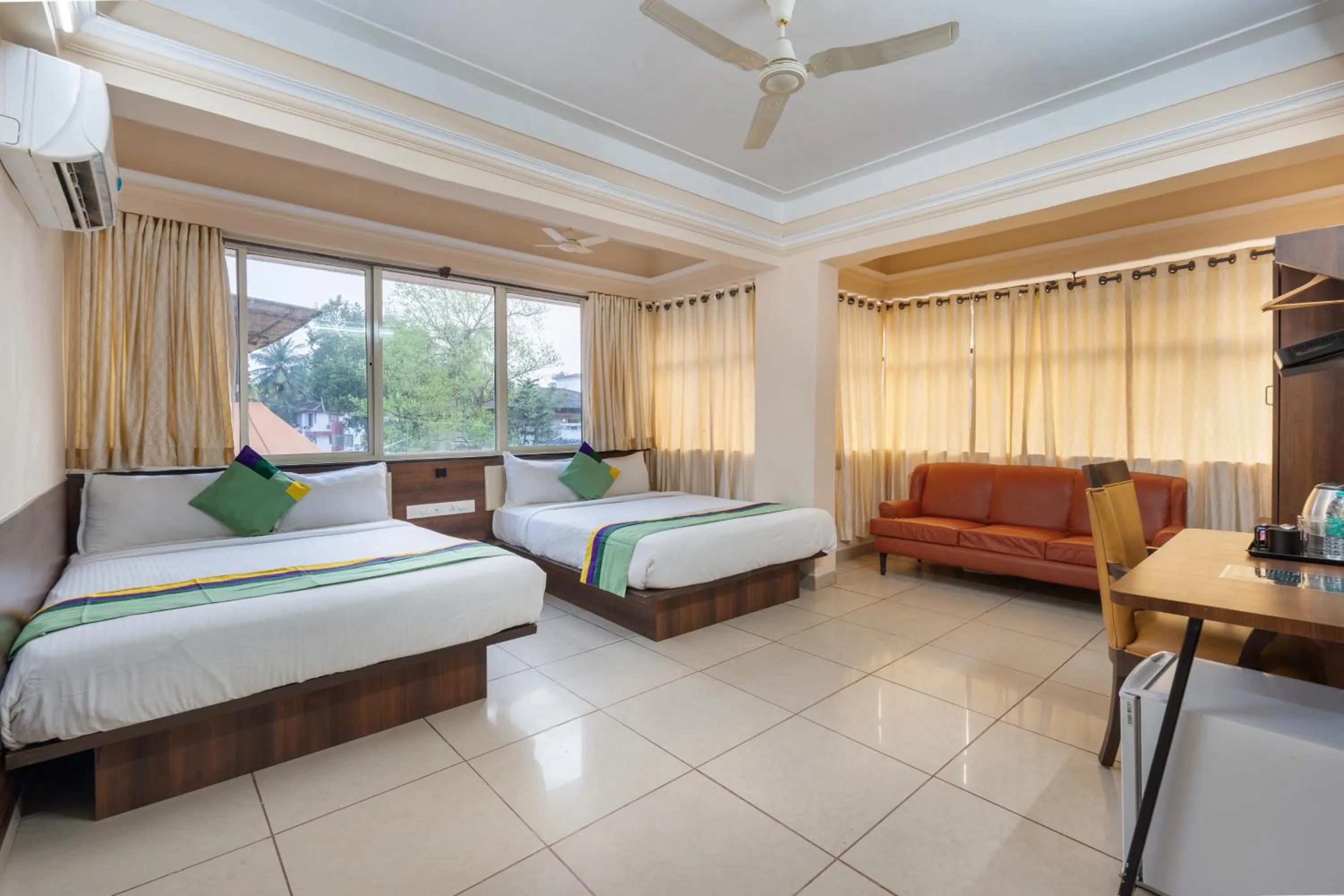 Bedroom, Bed in Treebo Sunheads