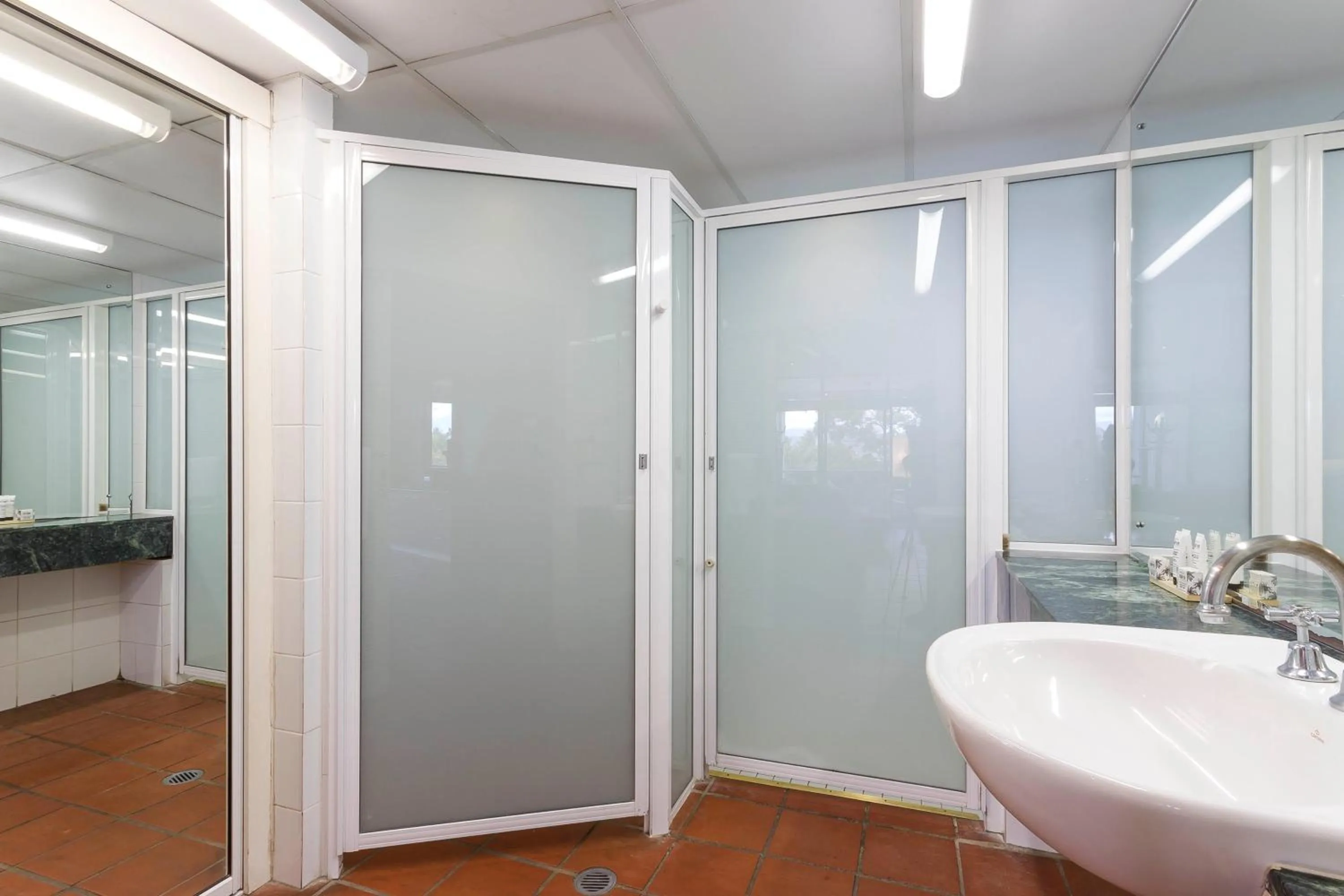 Shower in Club Tropical Resort - Official Onsite Reception & Check In