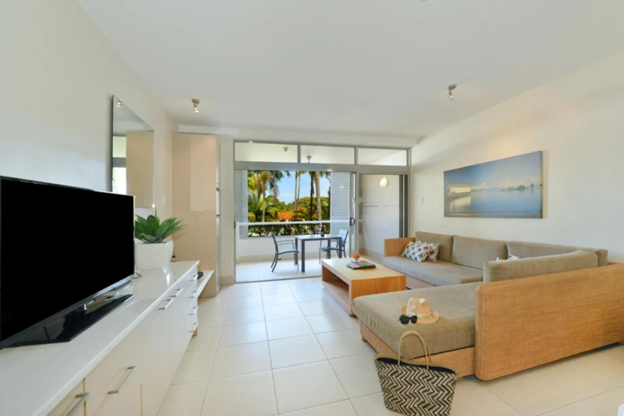 TV and multimedia in Club Tropical Resort - Official Onsite Reception & Check In