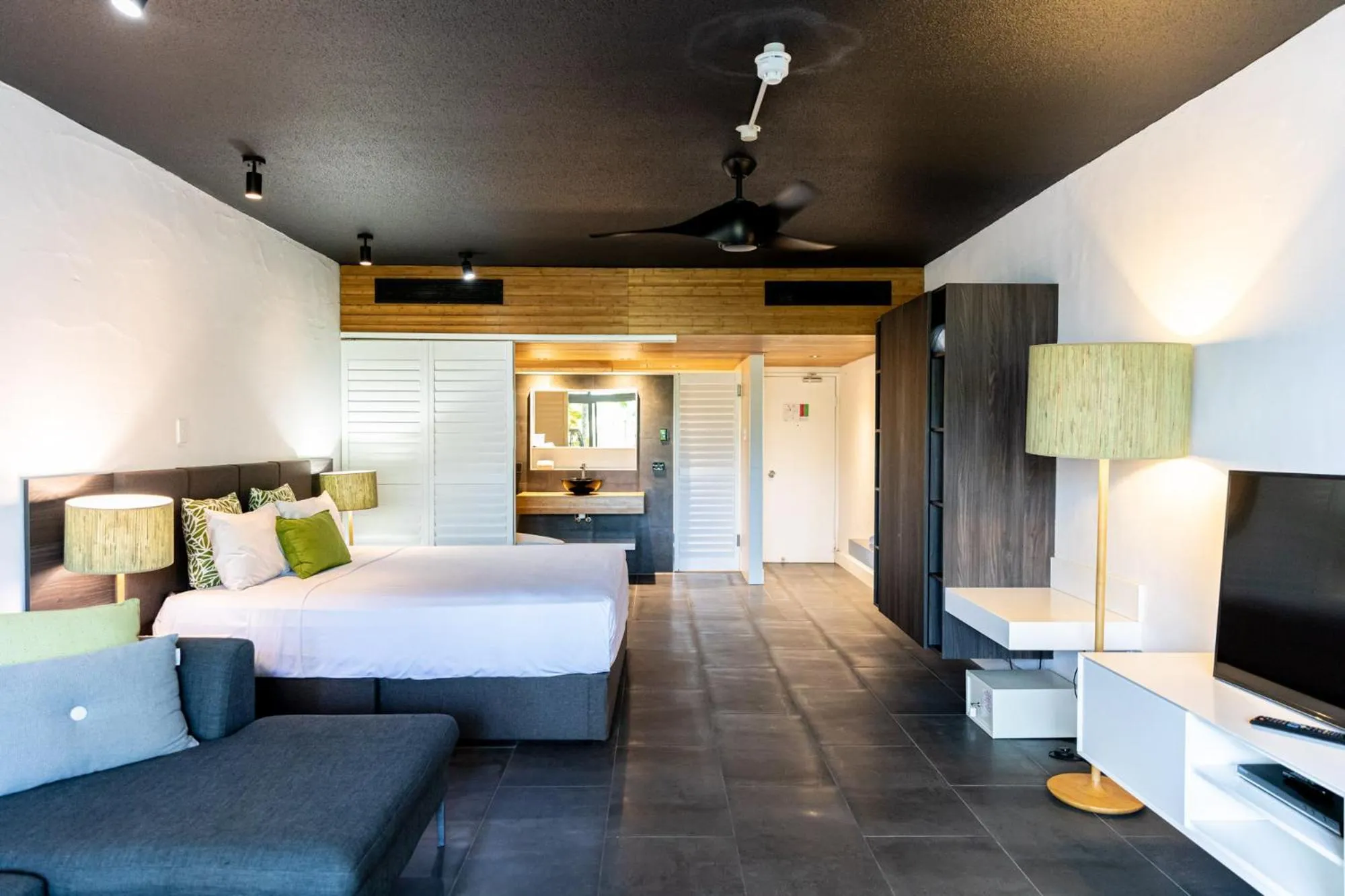 Bed in Club Tropical Resort - Official Onsite Reception & Check In